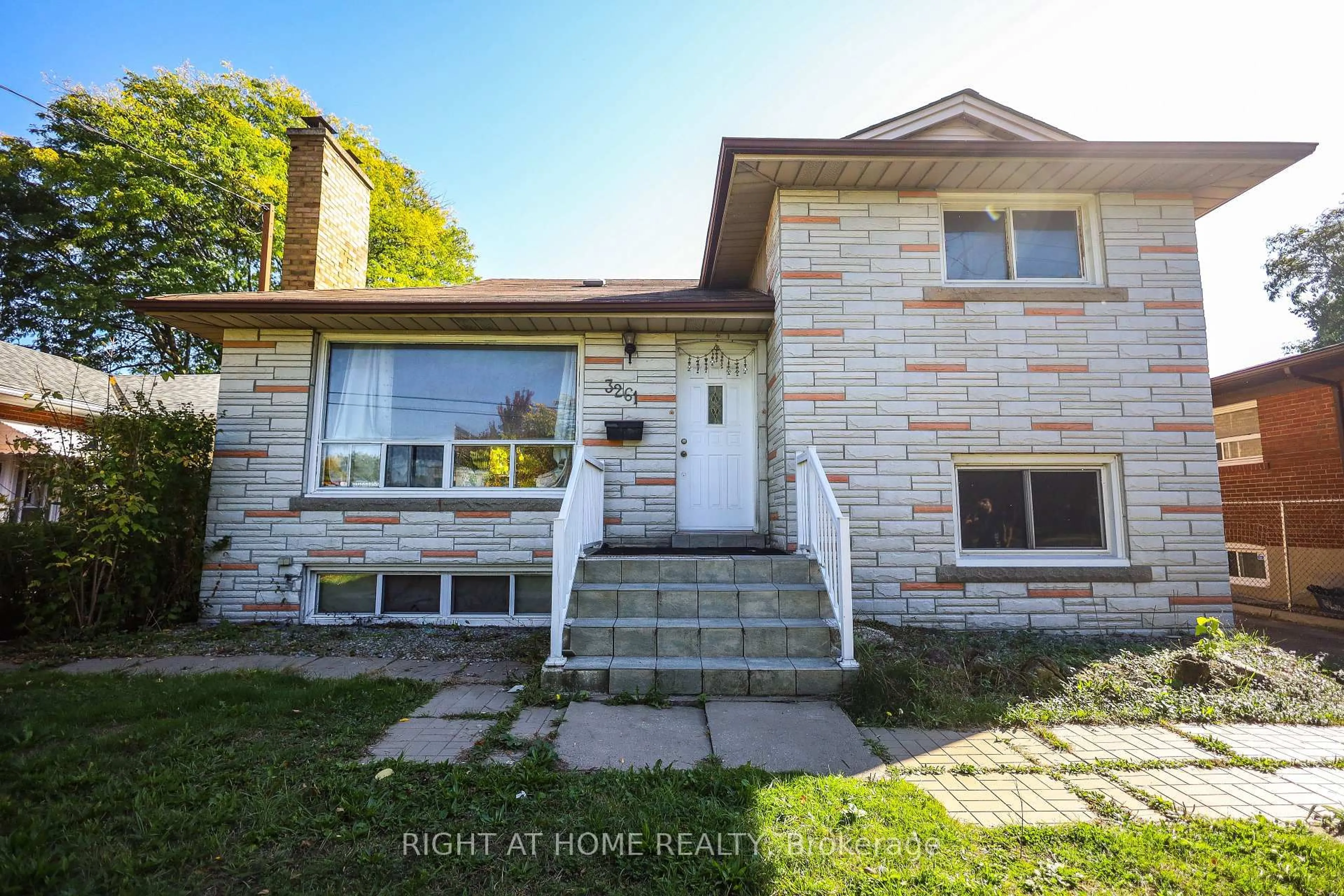 Home with brick exterior material, street for 3261 Lawrence Ave, Toronto Ontario M1H 1A5