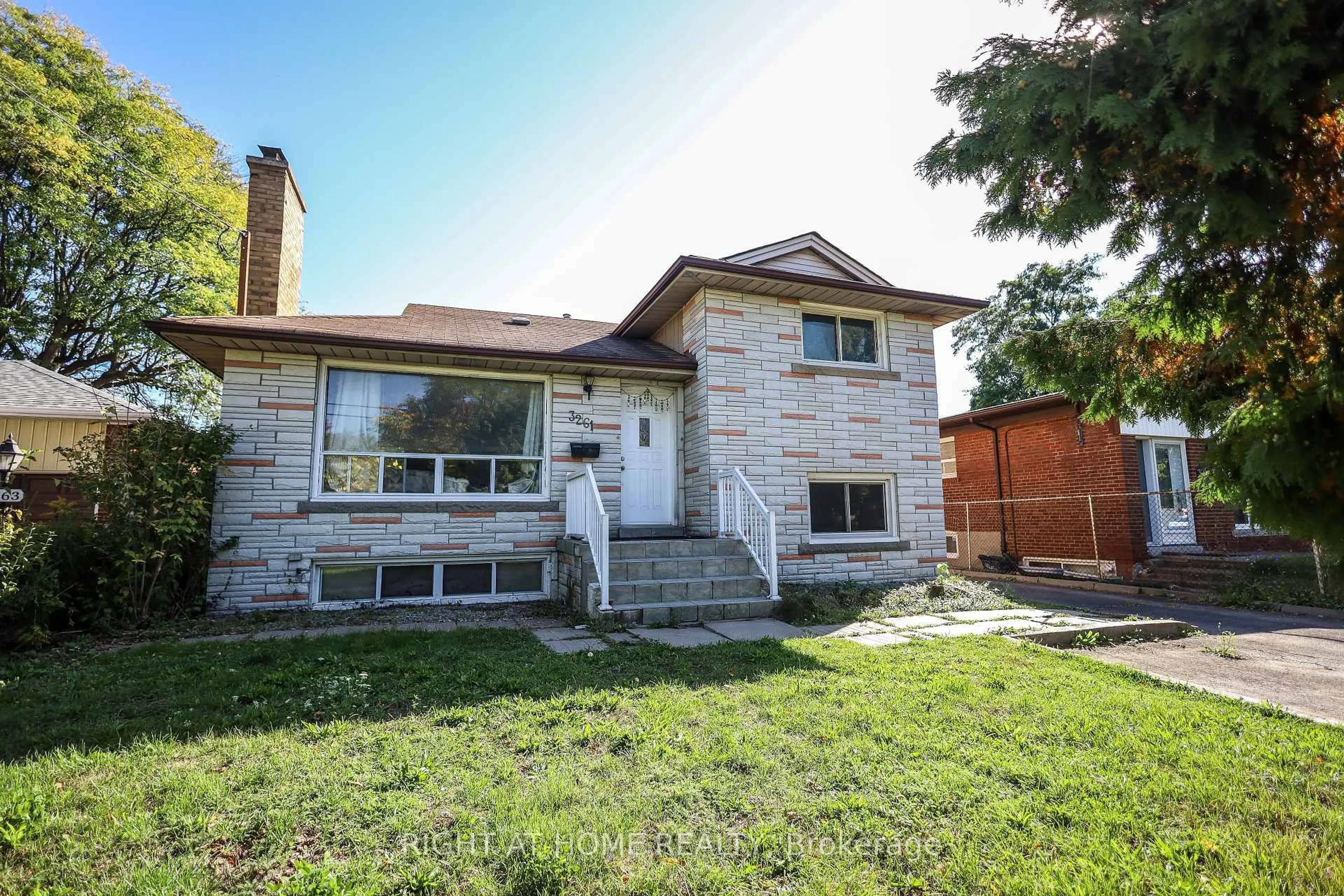Home with brick exterior material, street for 3261 Lawrence Ave, Toronto Ontario M1H 1A5