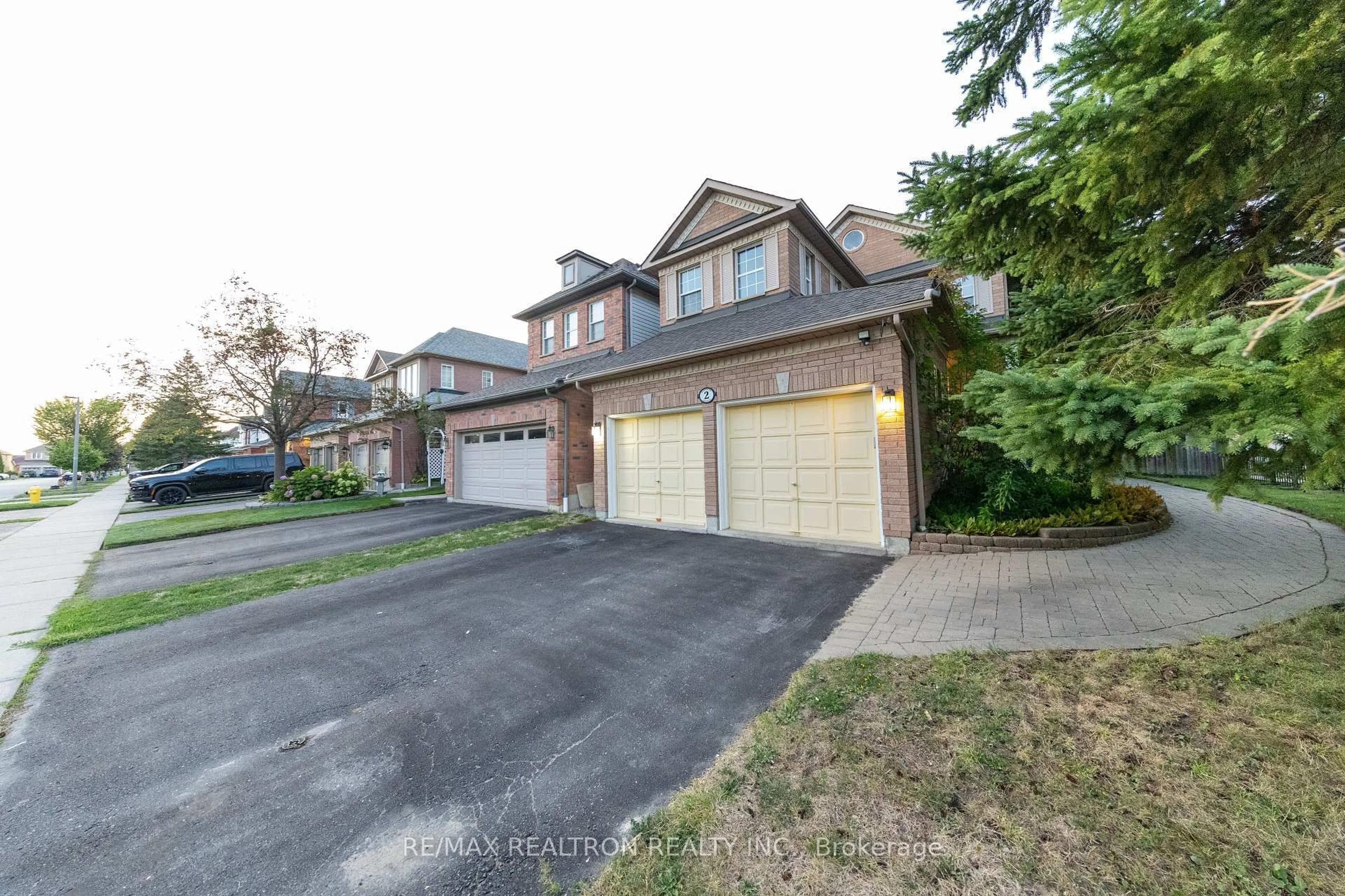 Home with brick exterior material, street for 2 Randolph Ave, Whitby Ontario L1P 1N2