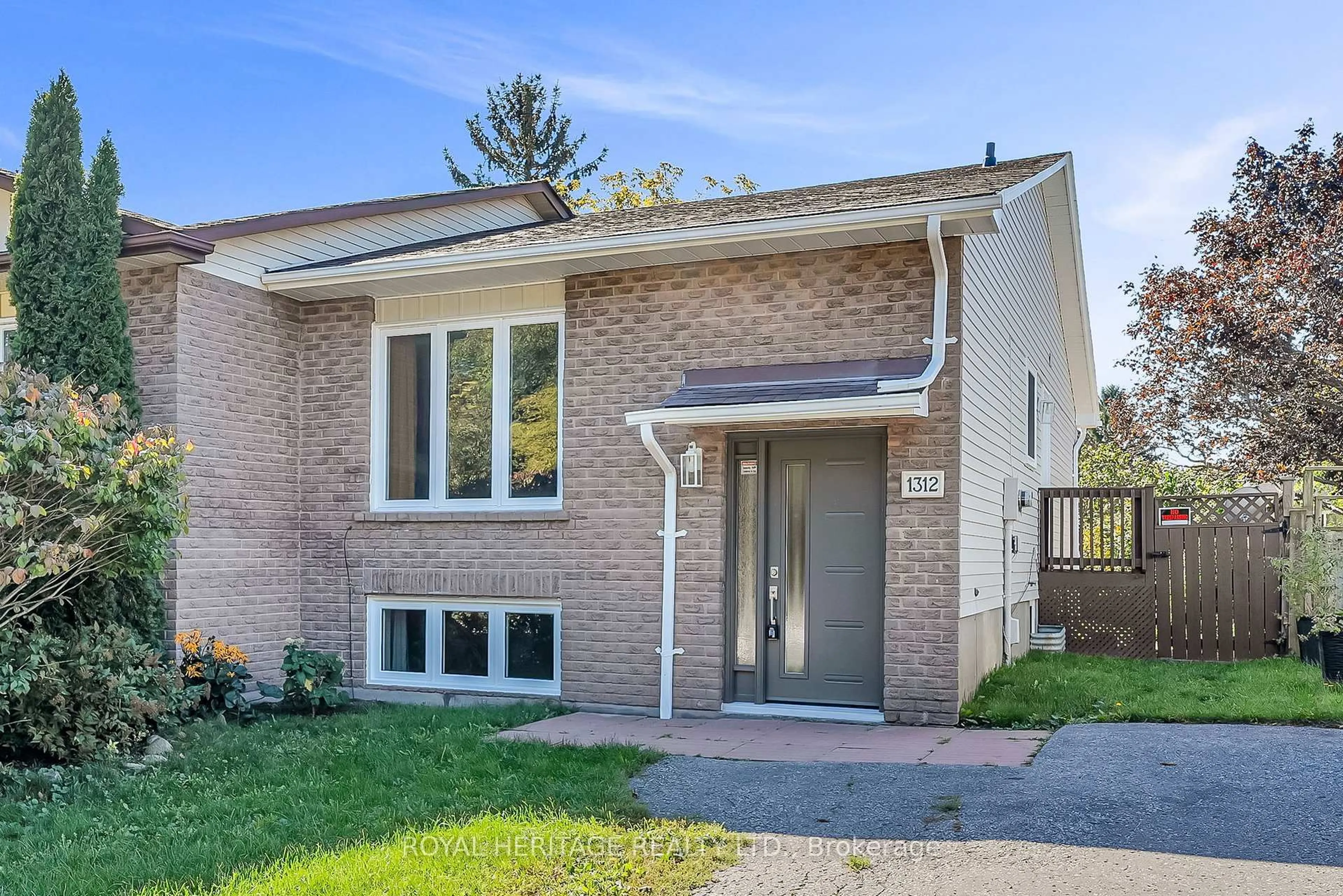 Home with brick exterior material, street for 1312 Valley Dr, Oshawa Ontario L1J 7J7