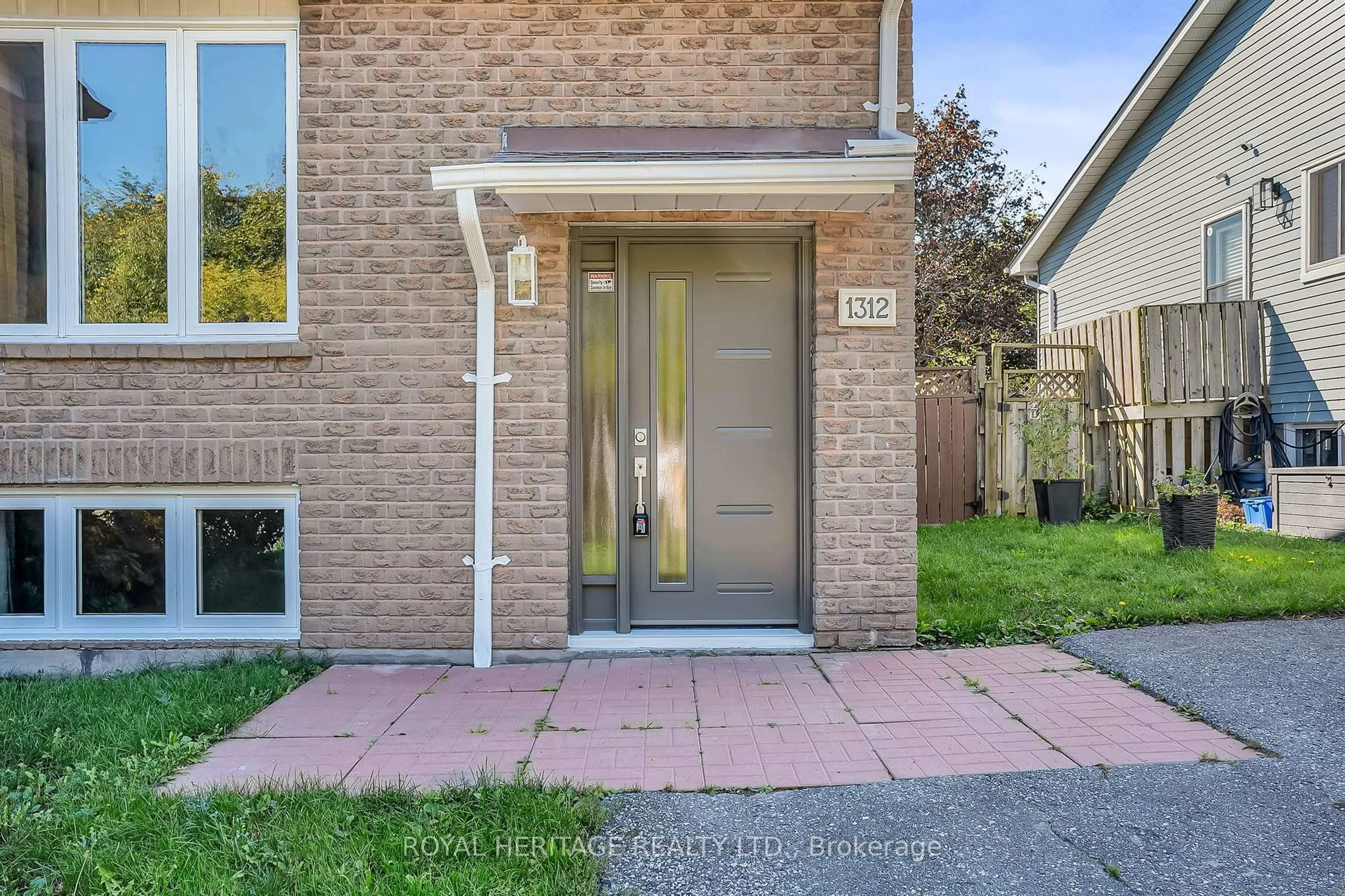 Home with brick exterior material, street for 1312 Valley Dr, Oshawa Ontario L1J 7J7