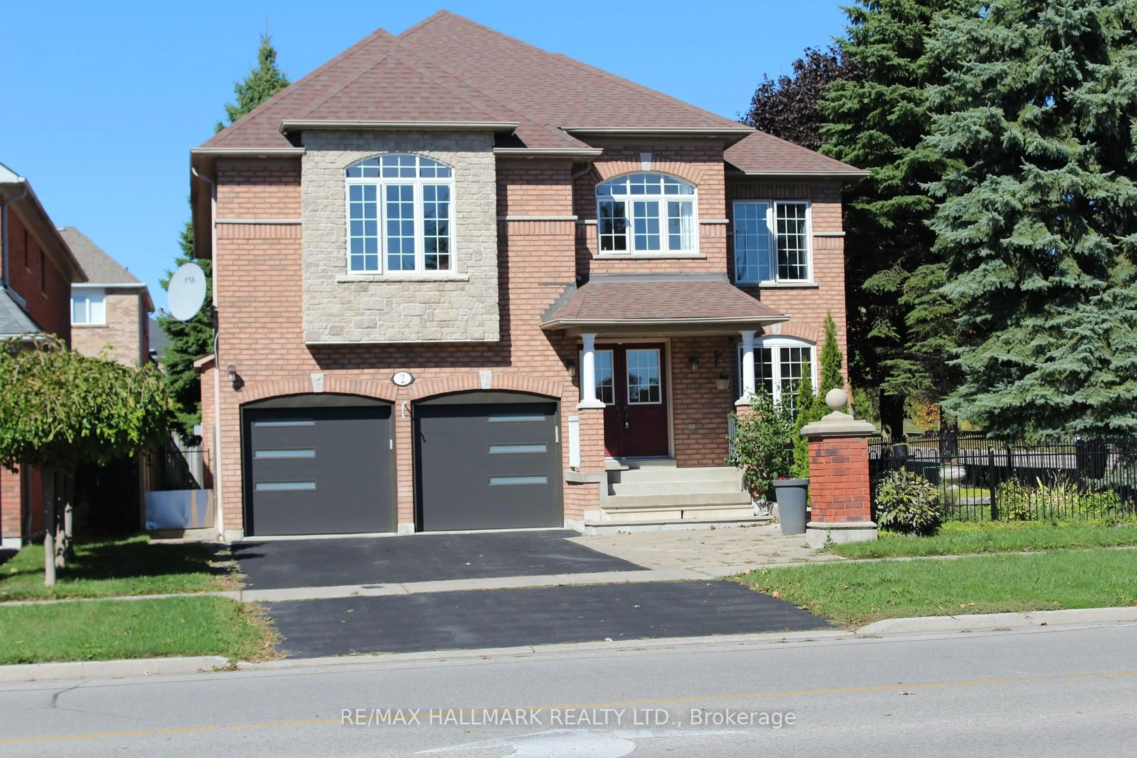 Home with brick exterior material, street for 2 Twin Streams Rd, Whitby Ontario L1P 1P1