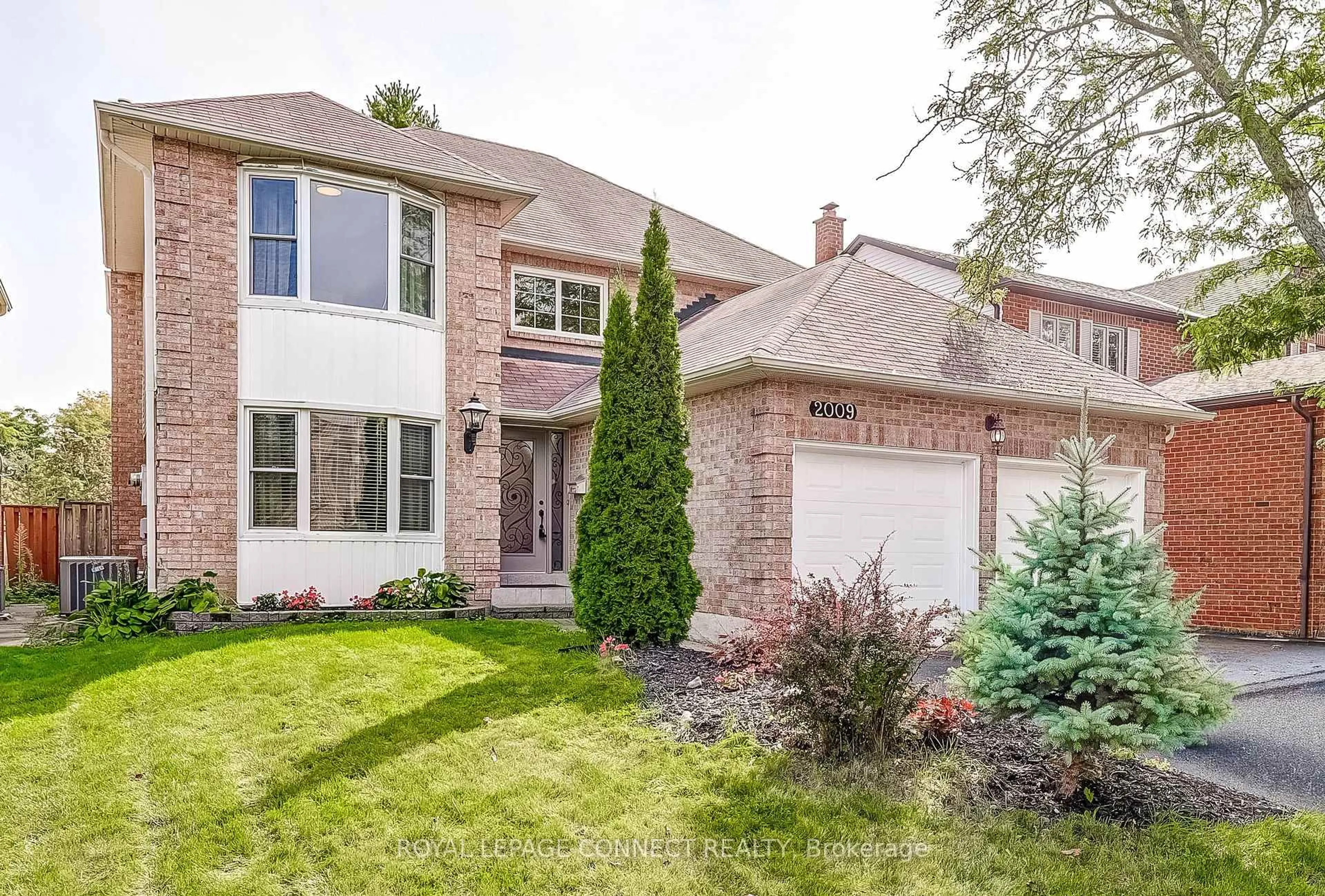 Home with brick exterior material, street for 2009 Bushmill St, Pickering Ontario L1X 1C8