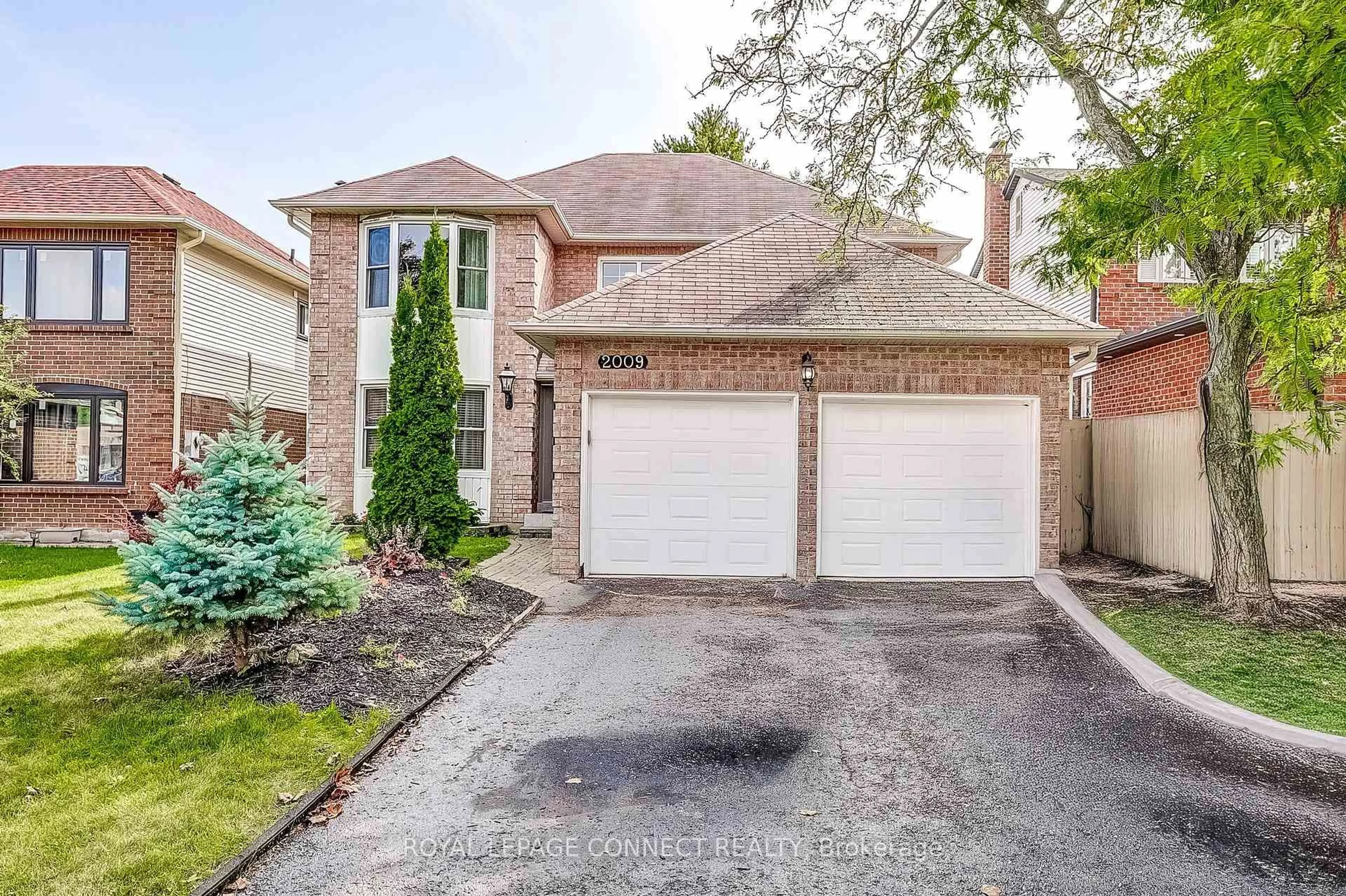 Home with brick exterior material, street for 2009 Bushmill St, Pickering Ontario L1X 1C8
