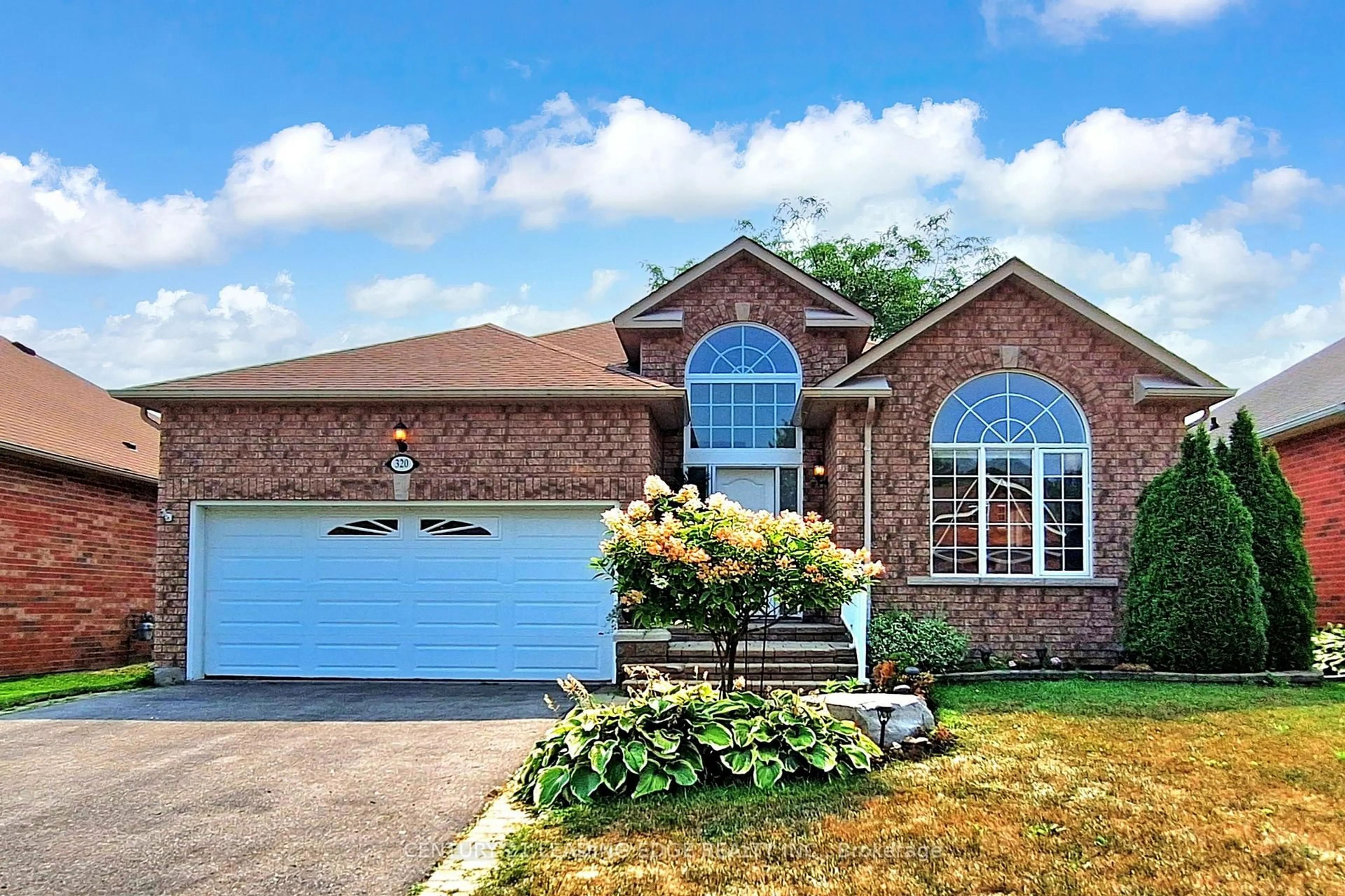 Home with brick exterior material, street for 320 Waterbury Cres, Scugog Ontario L9L 1T2