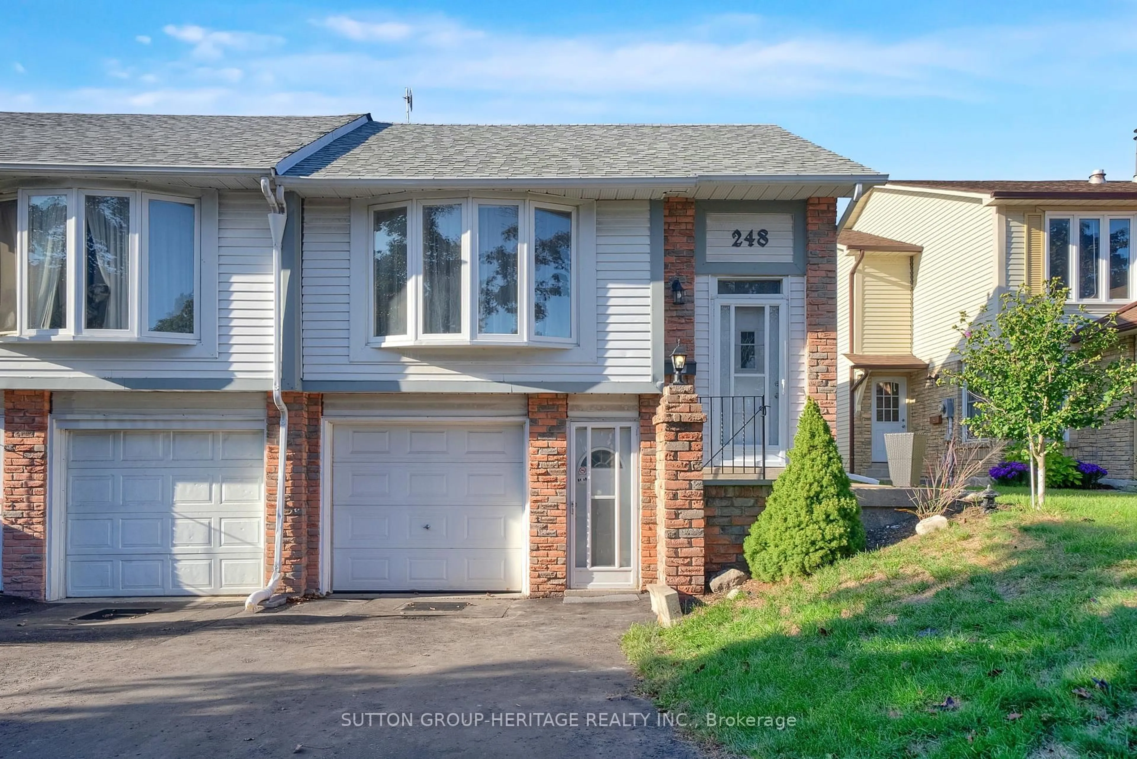 Home with vinyl exterior material, street for 248 Northminister Crt, Oshawa Ontario L1G 7M6