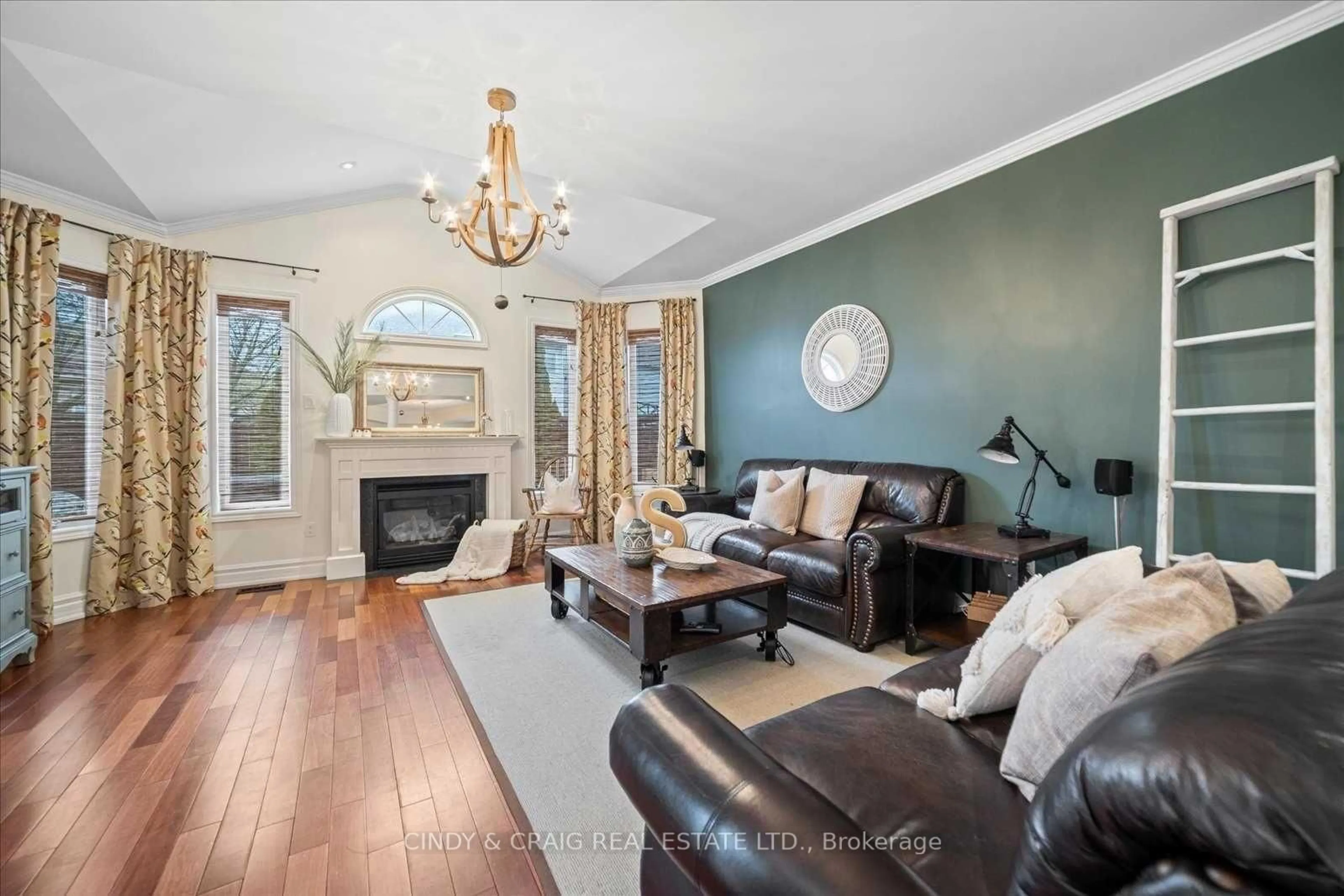 Living room with furniture, wood/laminate floor for 53 Mikayla Cres, Whitby Ontario L1M 2J1