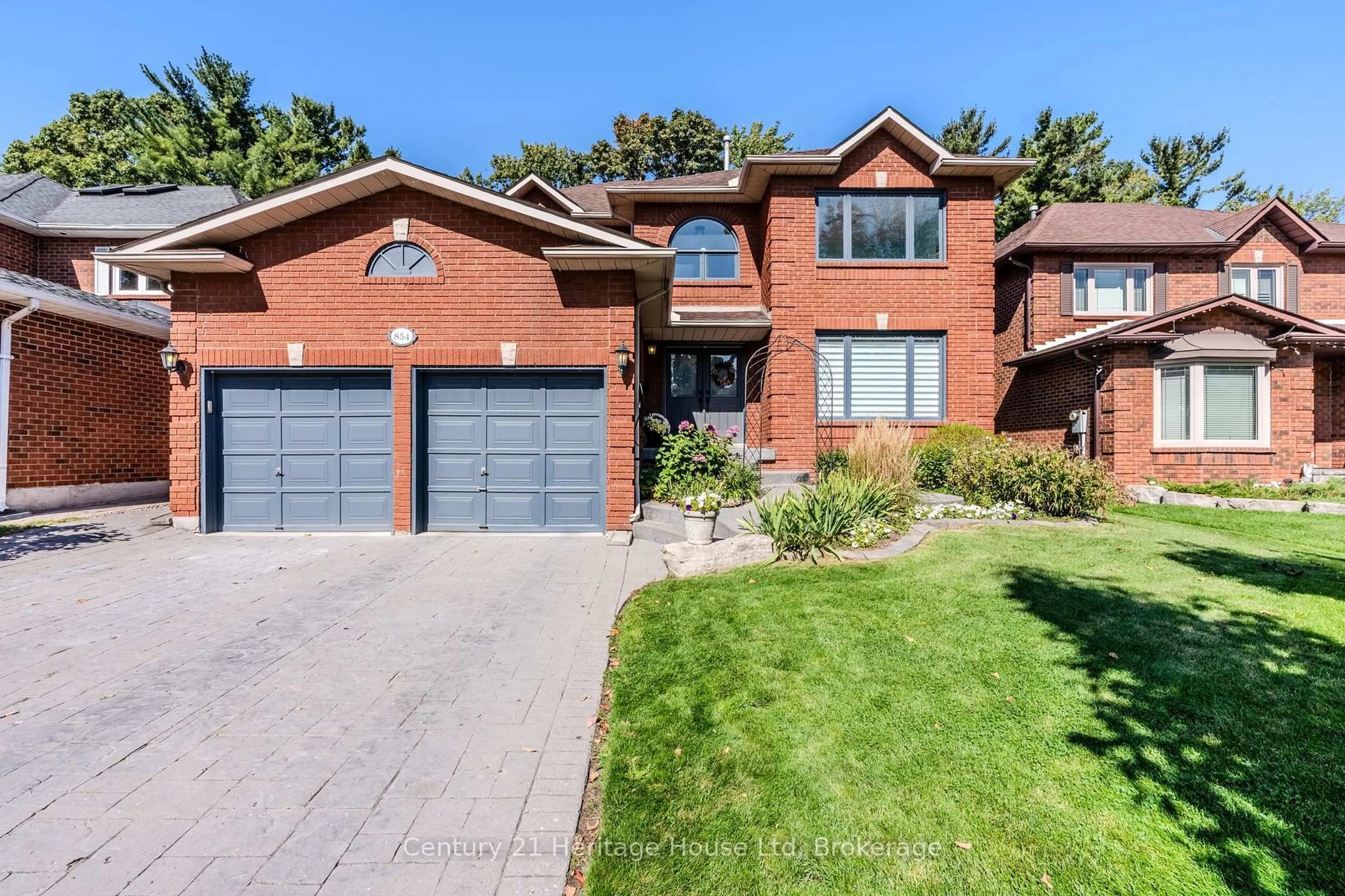 Home with brick exterior material, street for 854 Darwin Dr, Pickering Ontario L1X 2P7