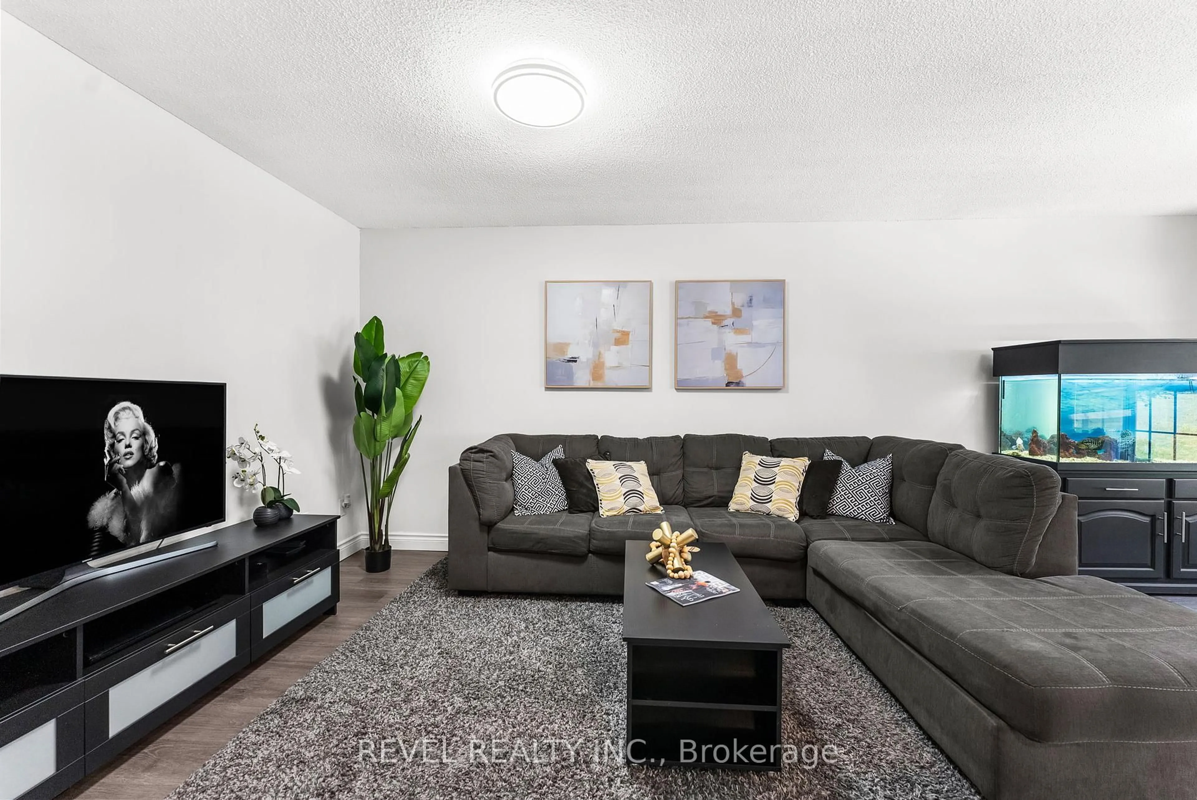 Living room with furniture, unknown for 1610 Crawforth St #60, Whitby Ontario L1N 9B1
