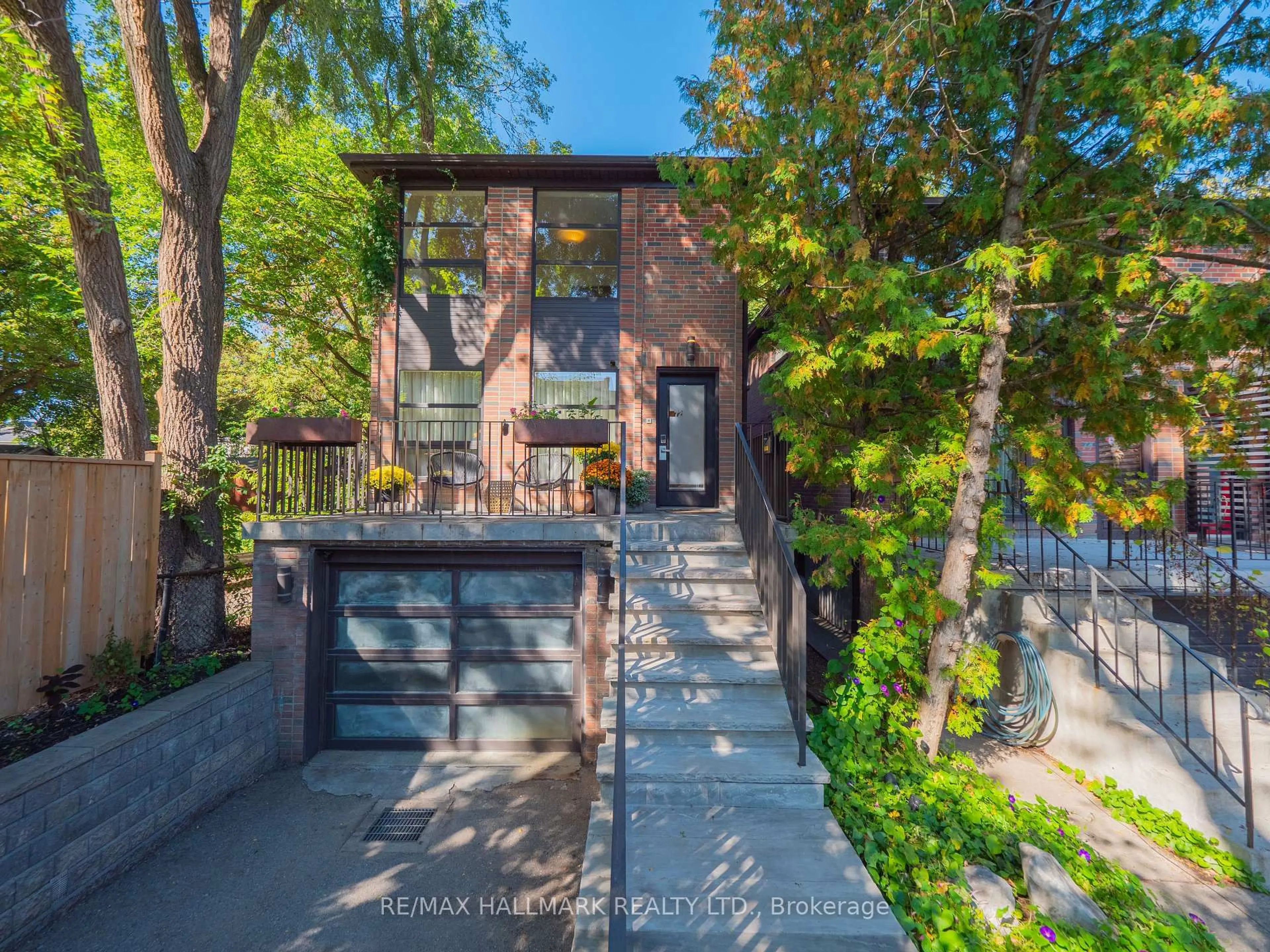 Home with brick exterior material, street for 72 Bain Ave, Toronto Ontario M4K 1E7
