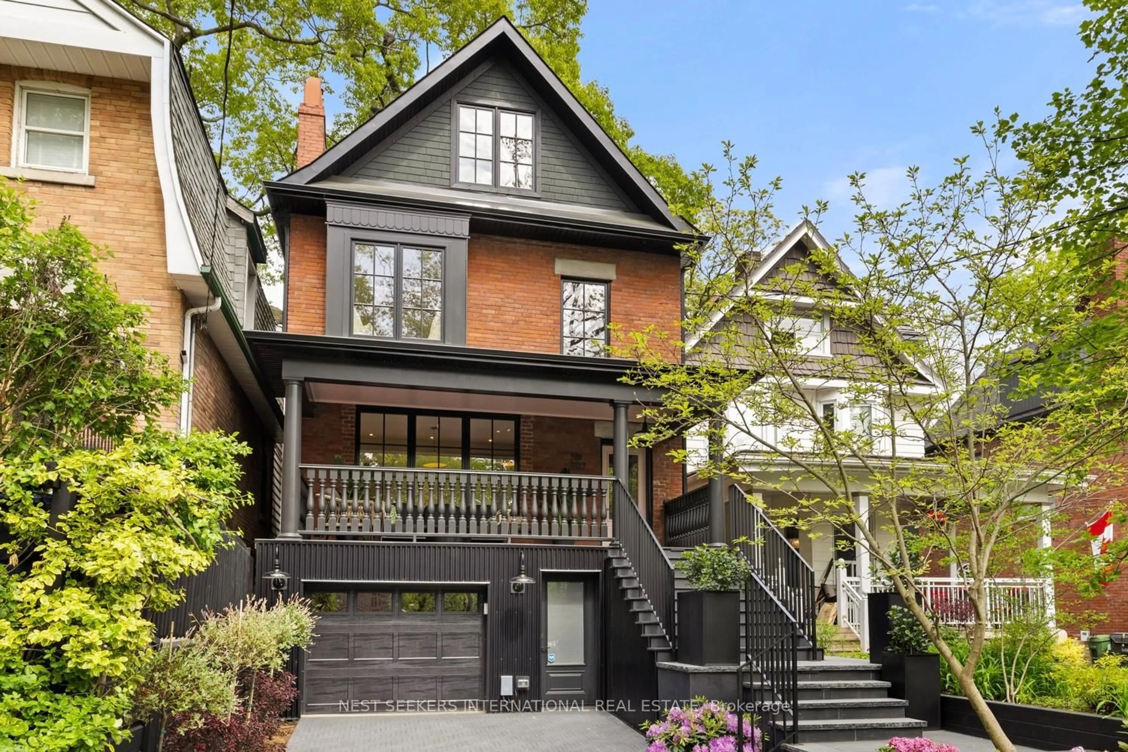 Home with brick exterior material, street for 203 Willow Ave, Toronto Ontario M4E 3K4