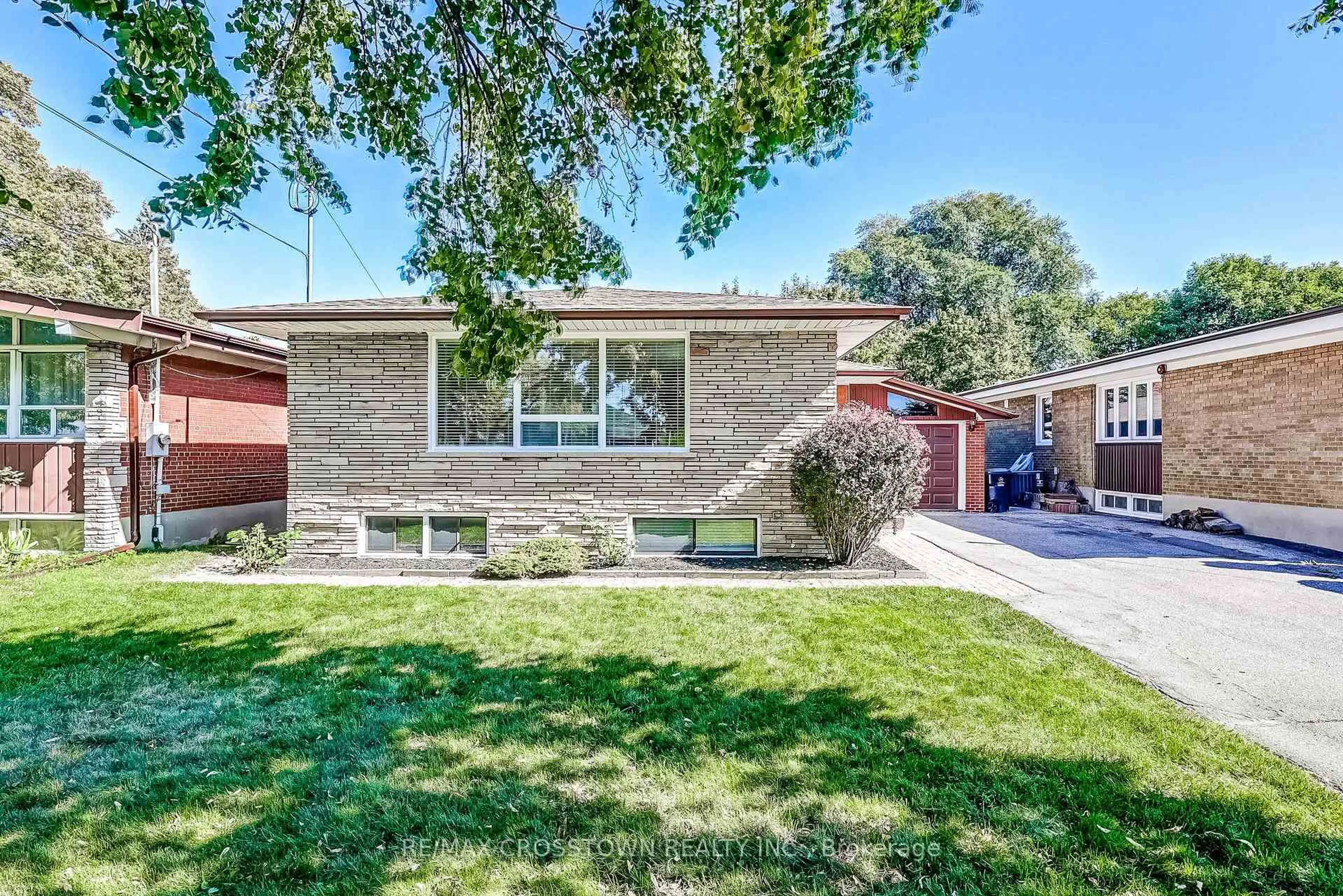 Home with brick exterior material, street for 38 Dignam Crt, Toronto Ontario M1J 2C5