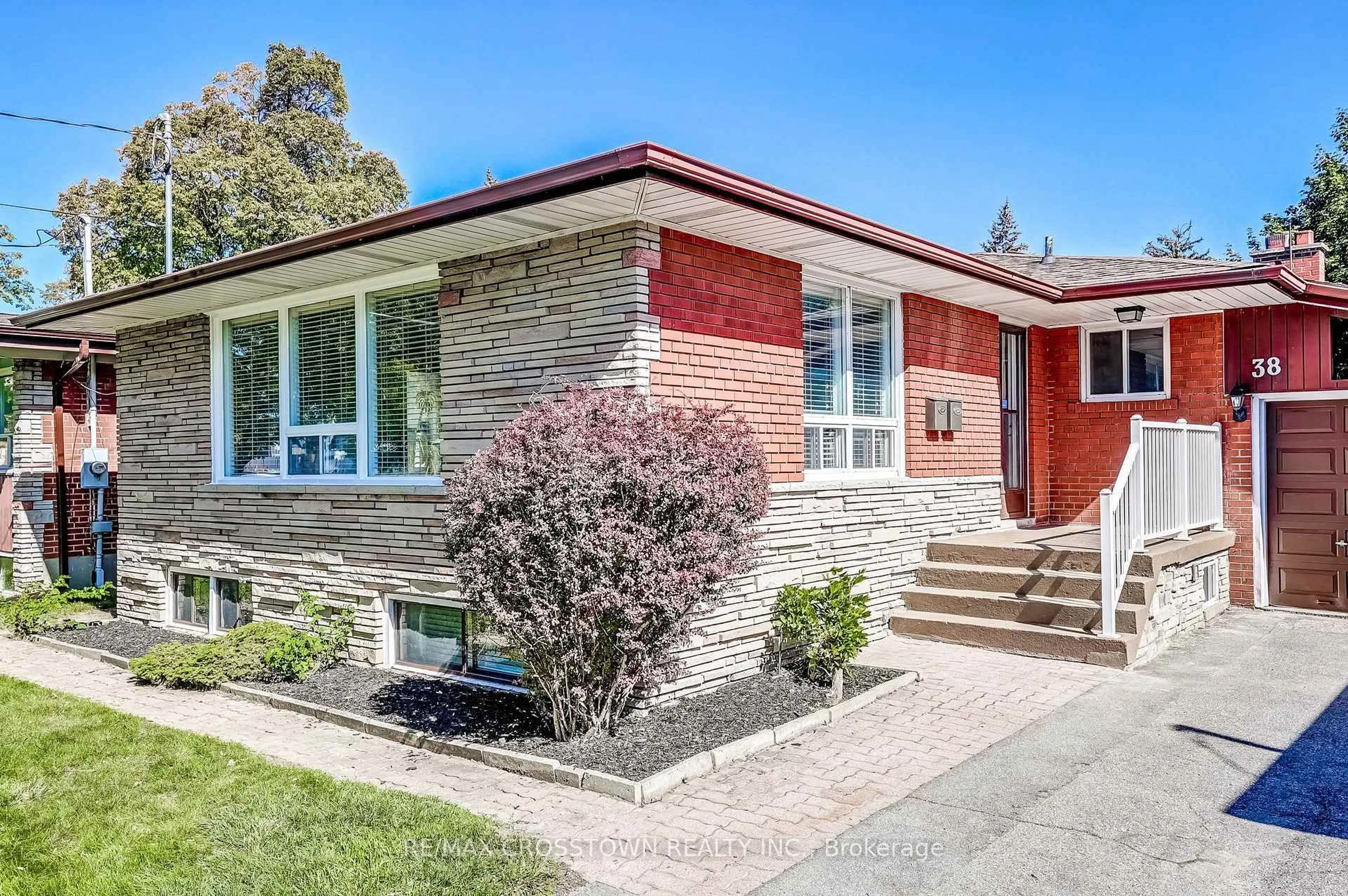 Home with brick exterior material, street for 38 Dignam Crt, Toronto Ontario M1J 2C5