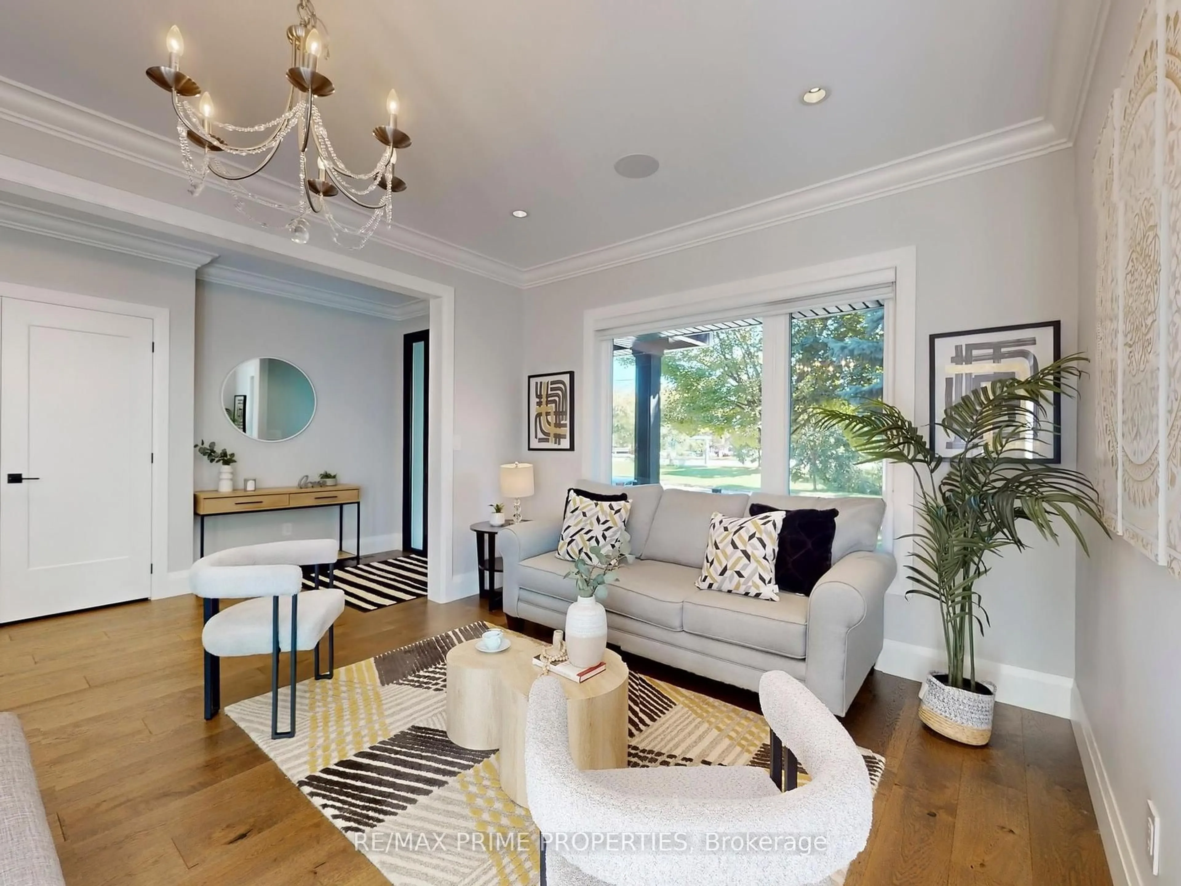Living room with furniture, wood/laminate floor for 116 Pinegrove Ave, Toronto Ontario M1N 2G9
