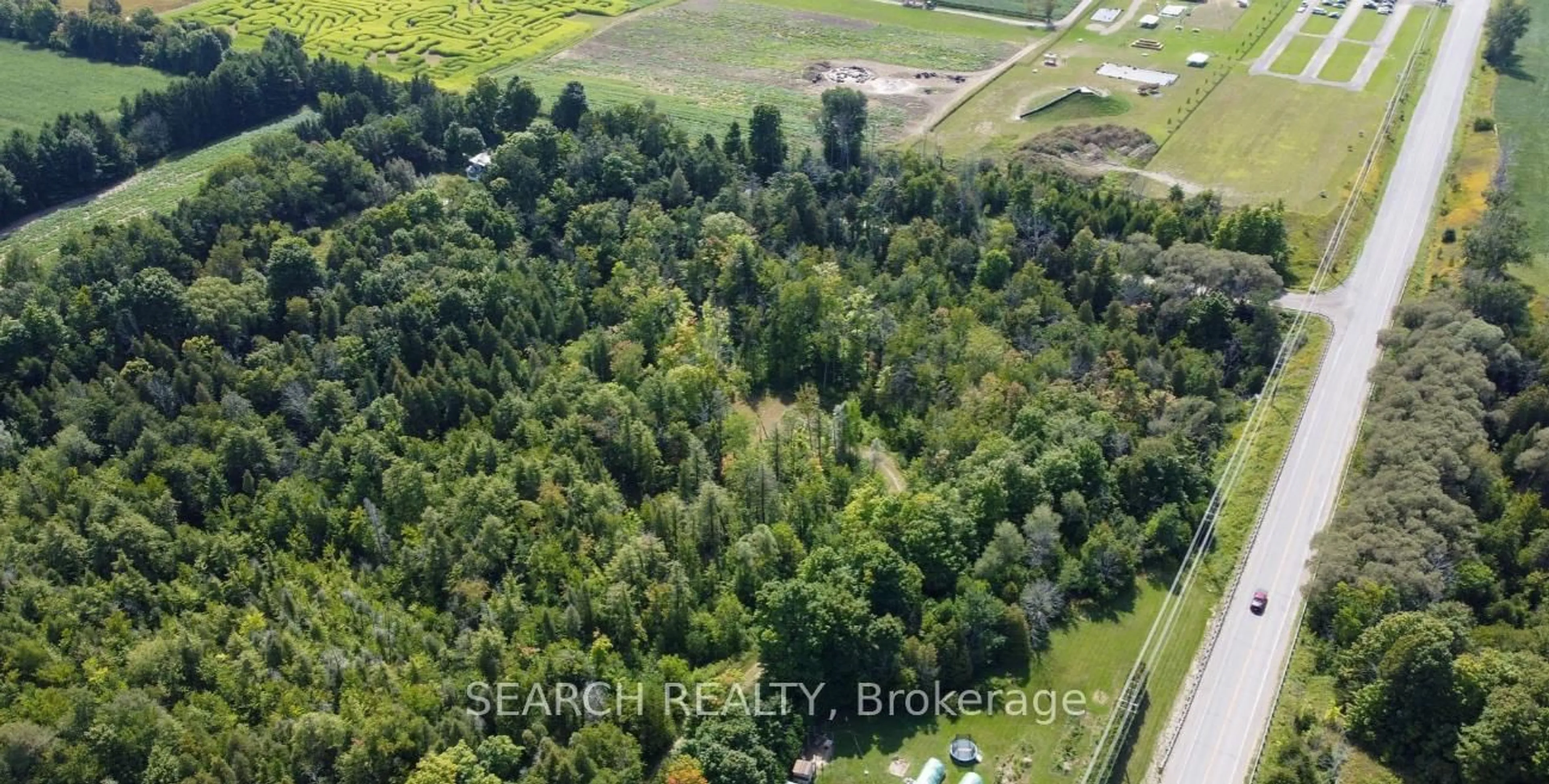 A pic from outside/outdoor area/front of a property/back of a property/a pic from drone, forest/trees view for 1889 Taunton Rd, Clarington Ontario L0B 1M0