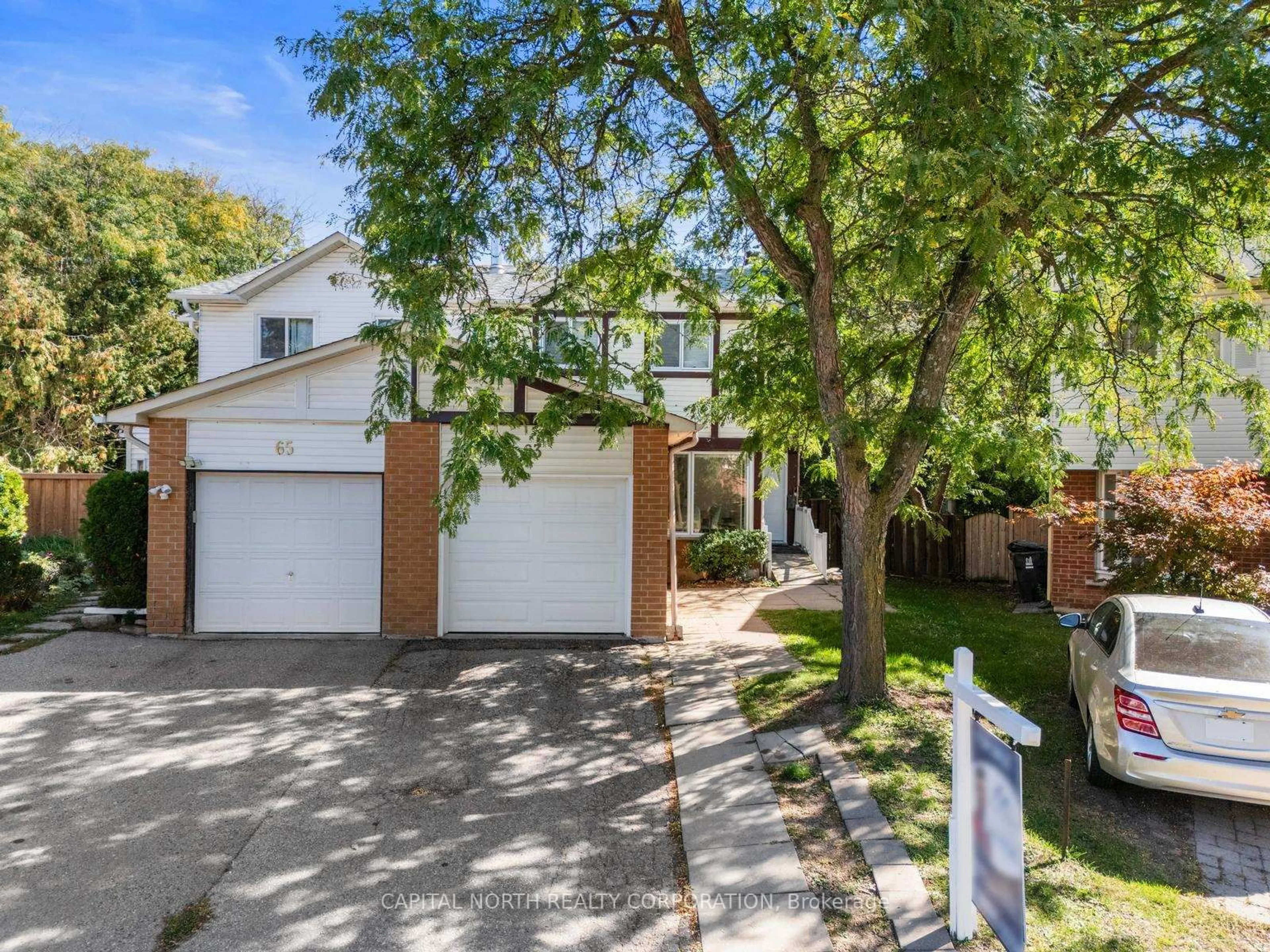 A pic from outside/outdoor area/front of a property/back of a property/a pic from drone, street for 63 Pondtail Dr, Toronto Ontario M1V 1Z3