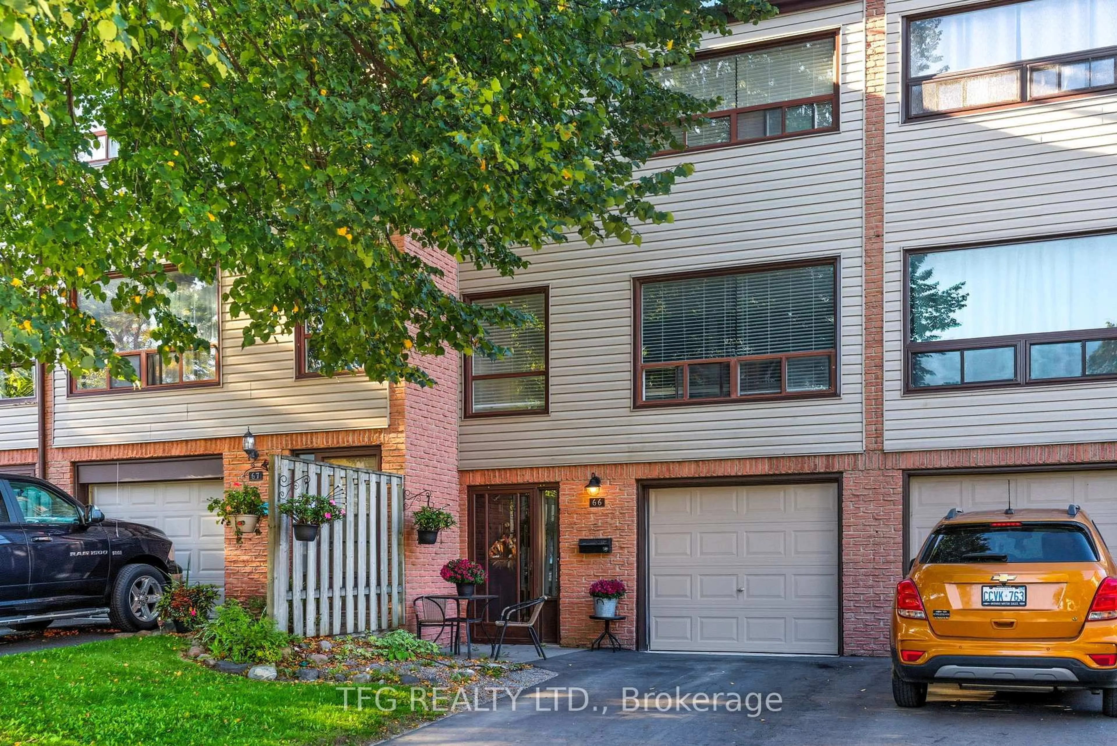 Home with brick exterior material, street for 66 Park Lane Circ #66, Clarington Ontario L1C 3V9