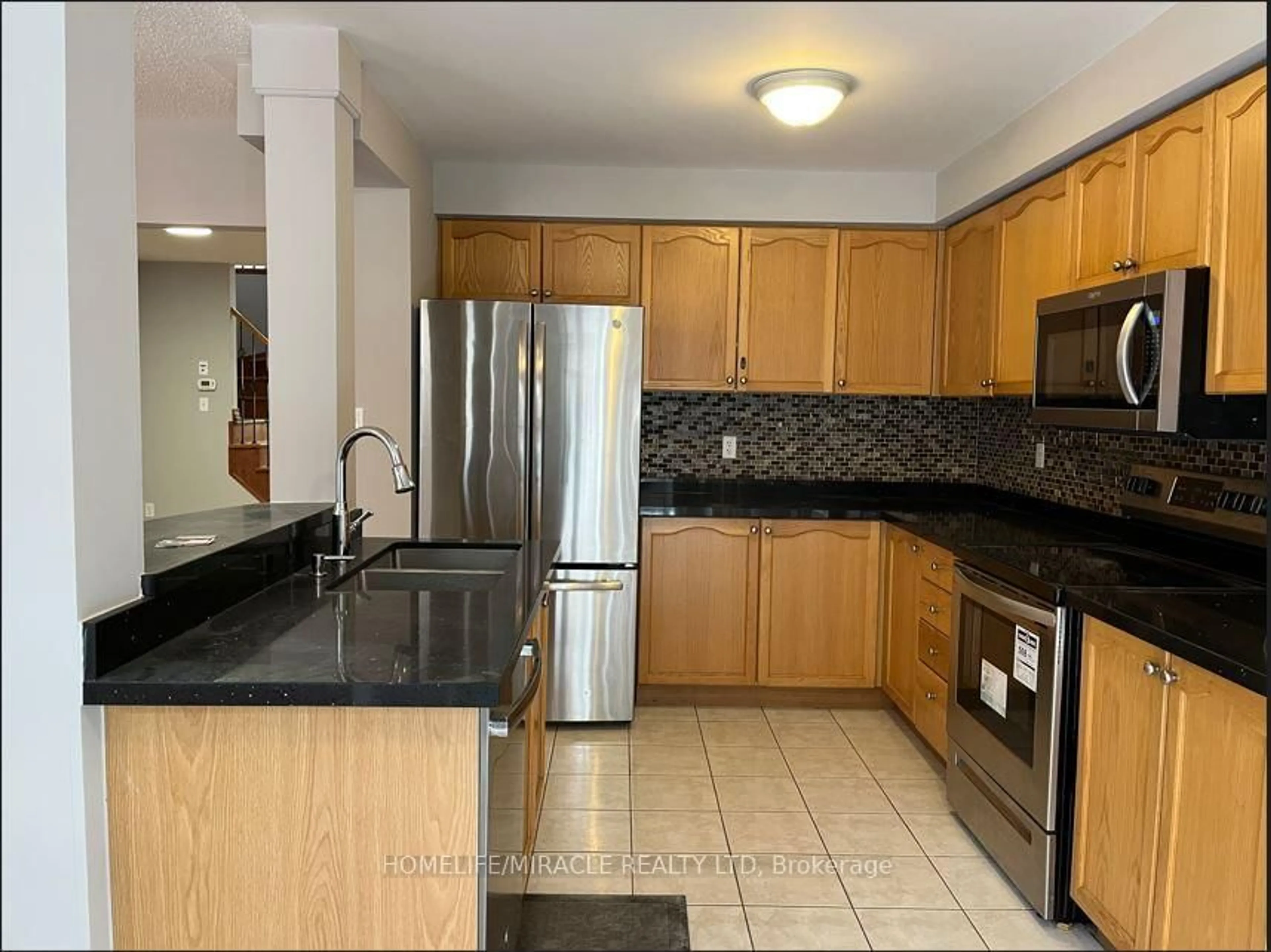Standard kitchen, ceramic/tile floor for 81 Vessel Cres, Toronto Ontario M1C 5K6