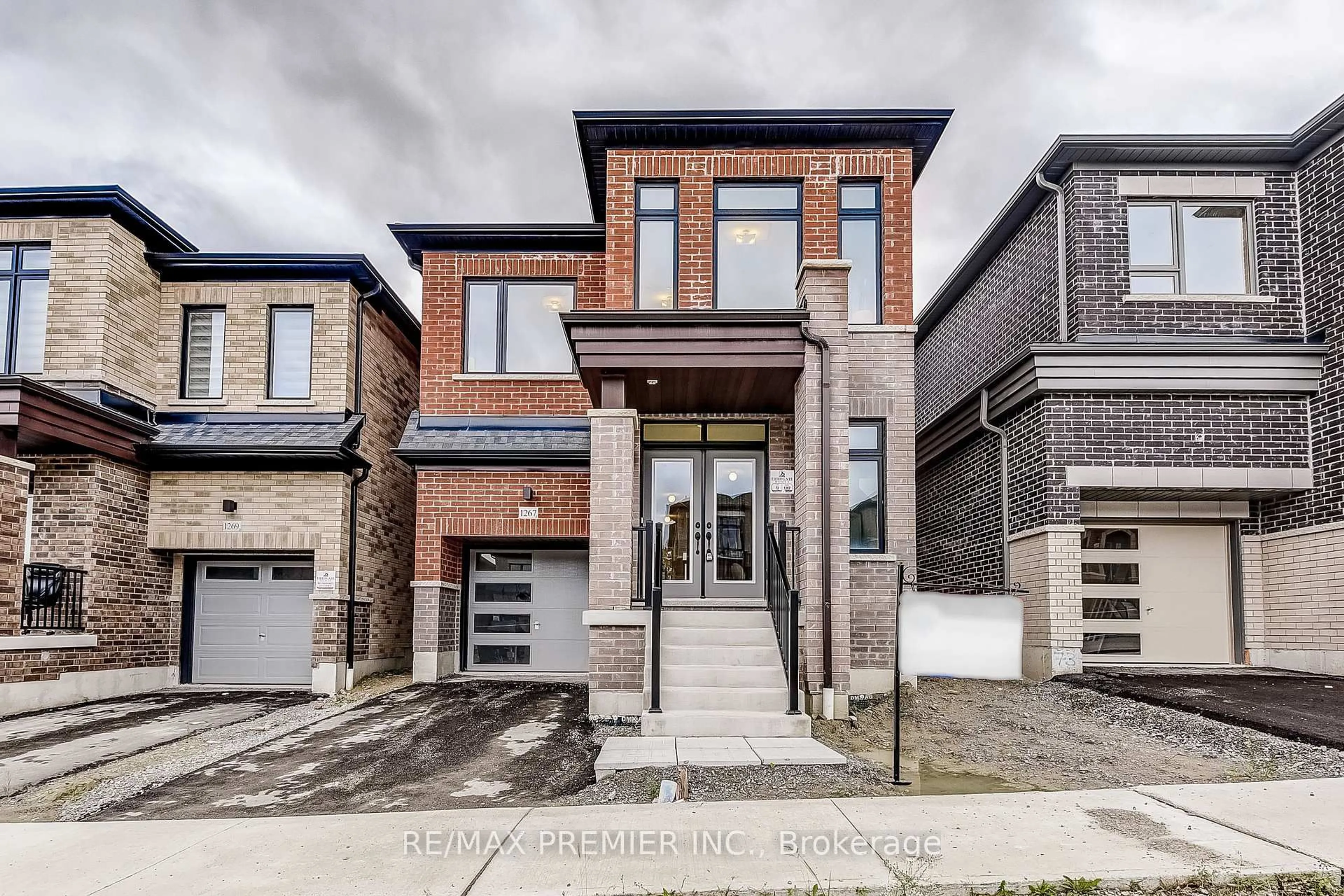 Home with brick exterior material, street for 1267 Talisman Manr, Pickering Ontario L1X 0K4