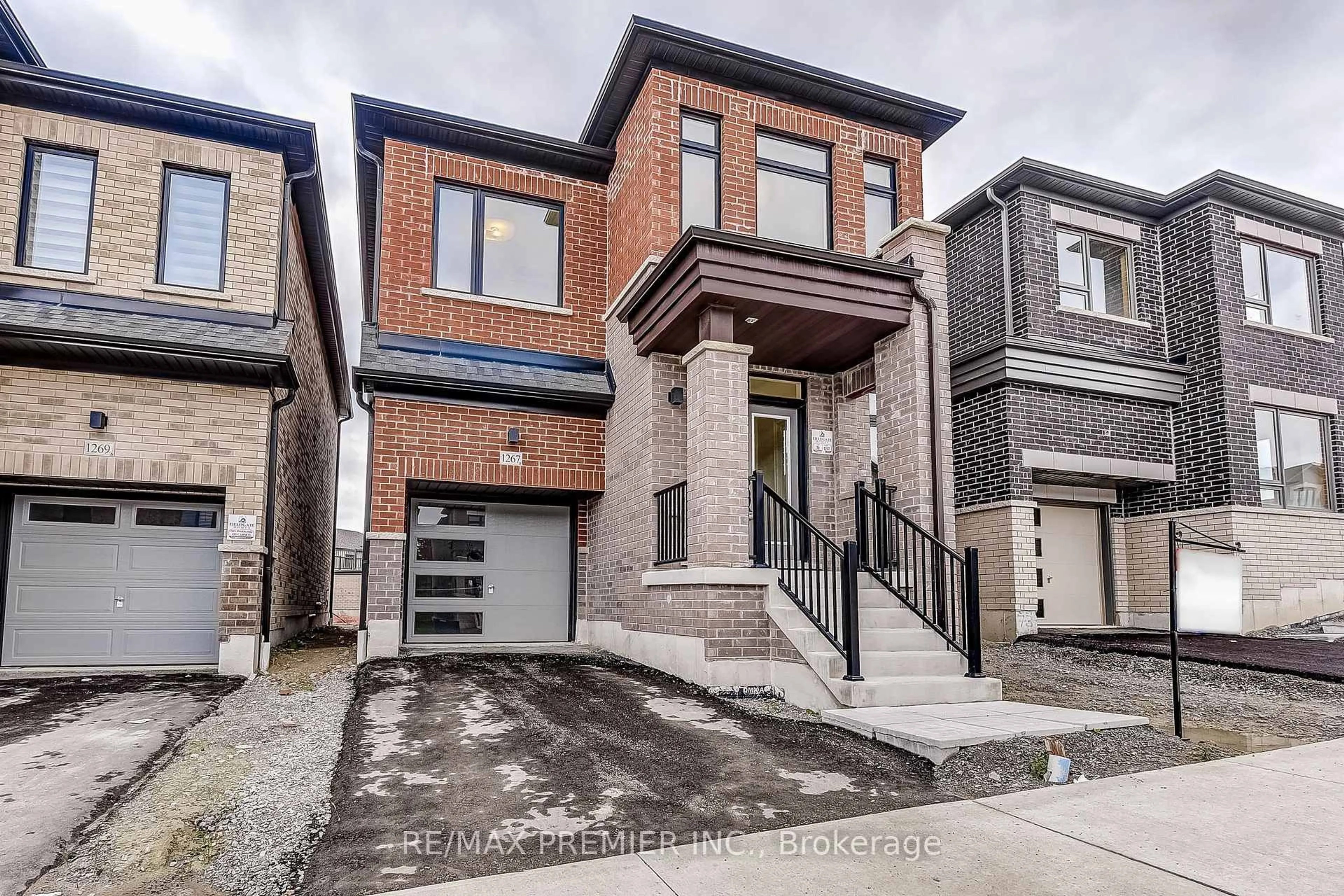 Home with brick exterior material, street for 1267 Talisman Manr, Pickering Ontario L1X 0K4
