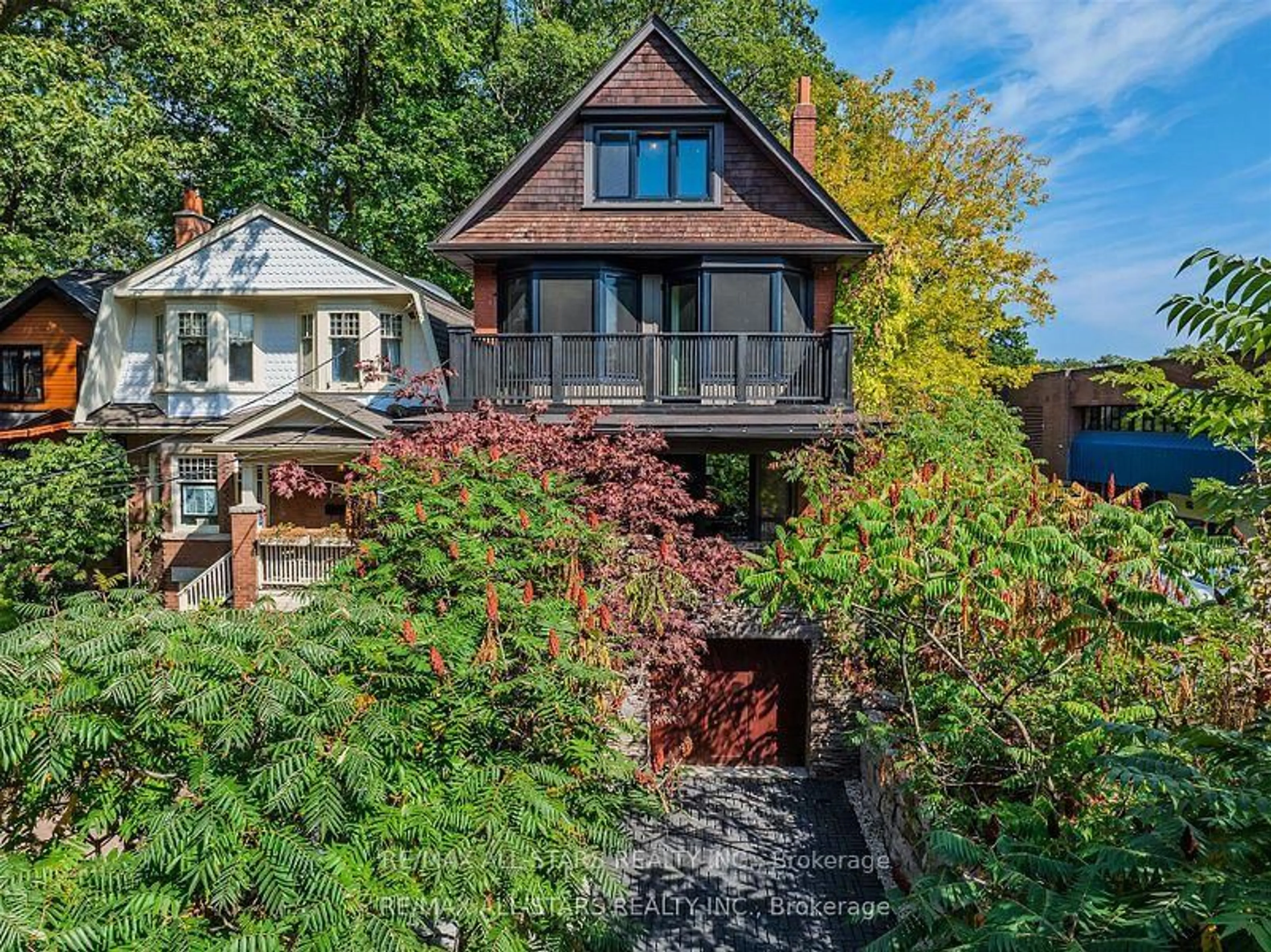 A pic from outside/outdoor area/front of a property/back of a property/a pic from drone, street for 151 Balsam Ave, Toronto Ontario M4E 3C2