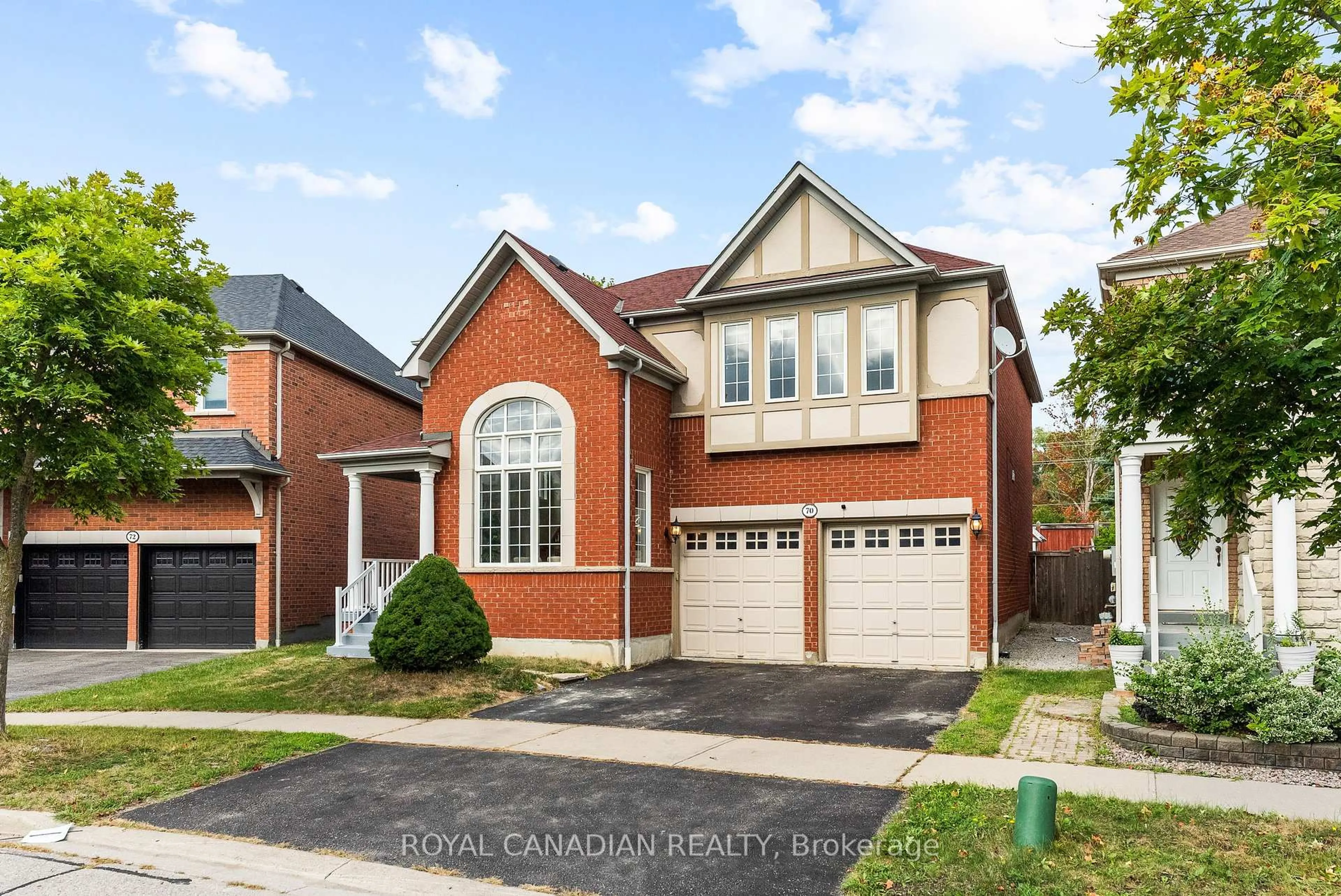 Home with brick exterior material, street for 70 Morland Cres, Ajax Ontario L1T 4P5