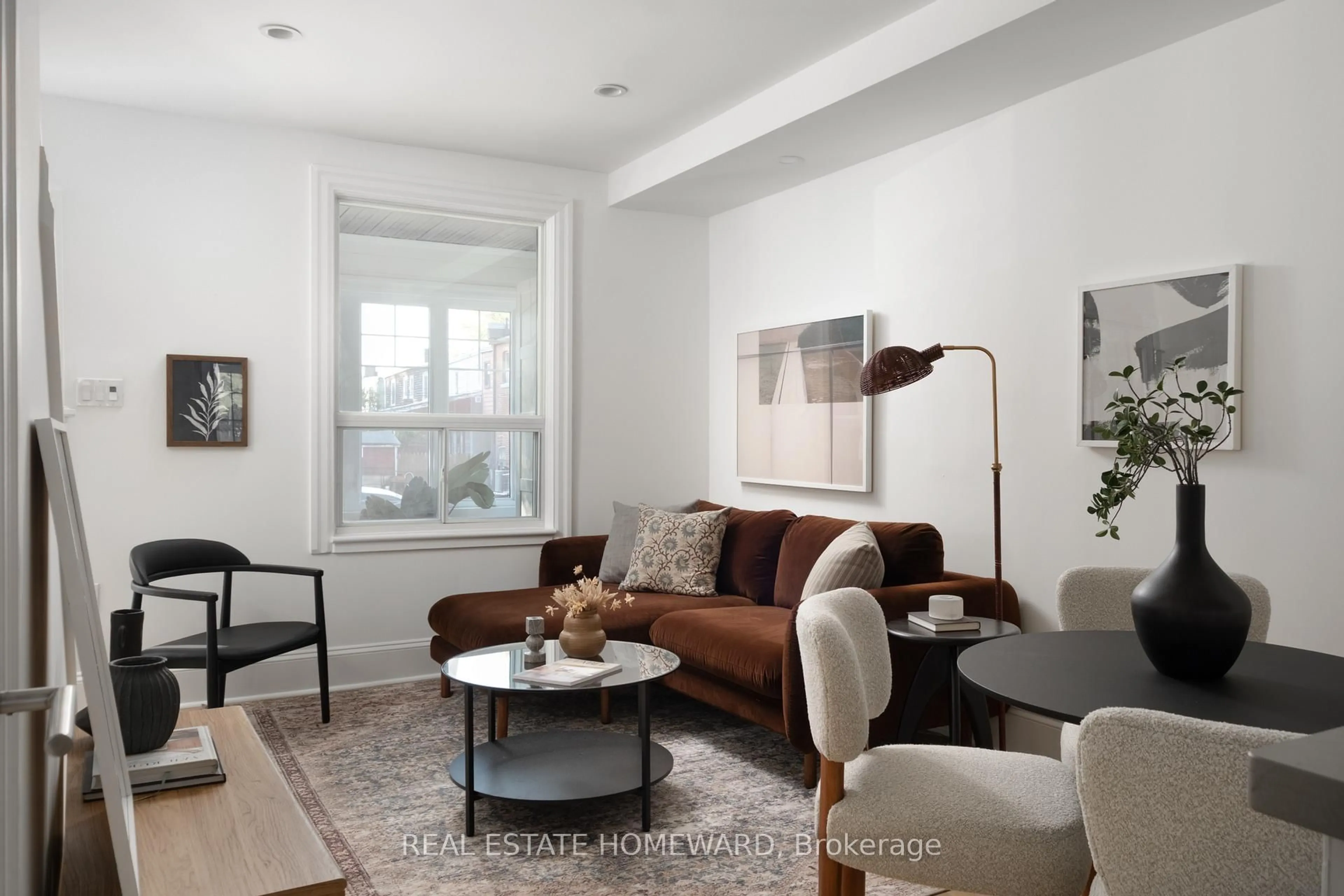 Living room with furniture, unknown for 674 Sammon Ave, Toronto Ontario M4C 2E2