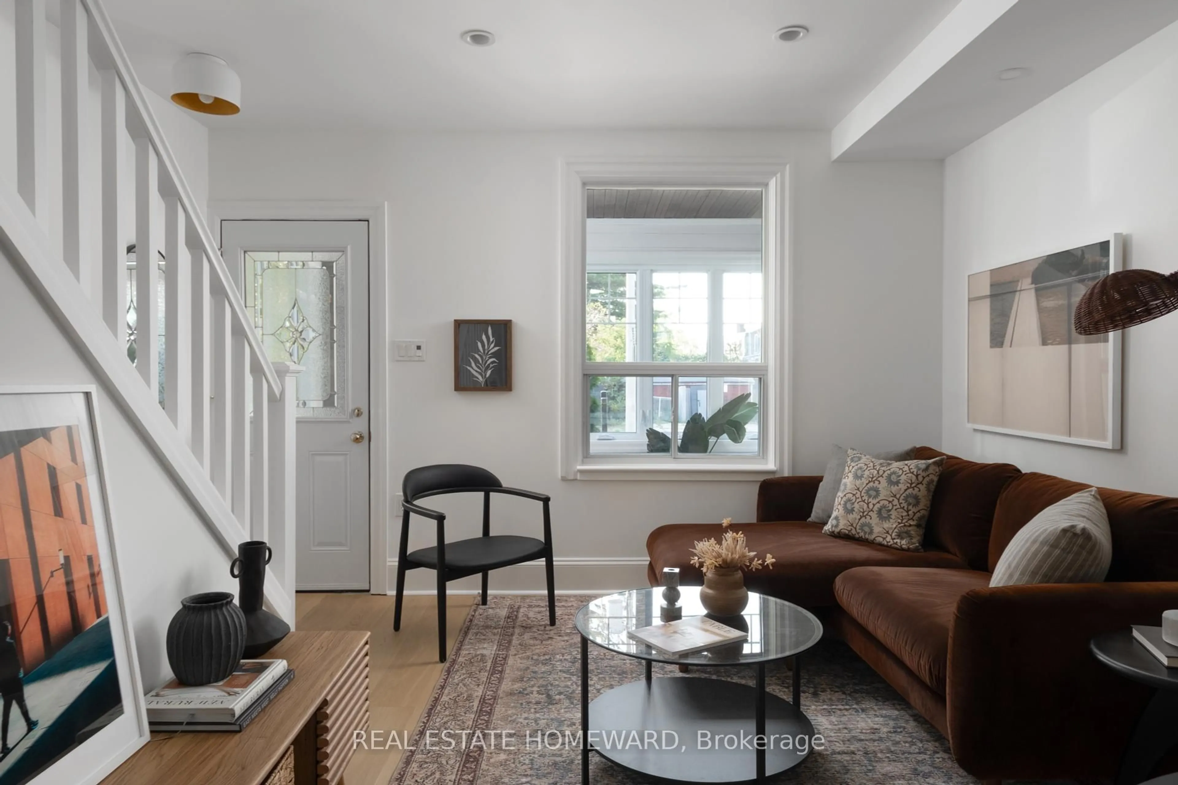 Living room with furniture, unknown for 674 Sammon Ave, Toronto Ontario M4C 2E2