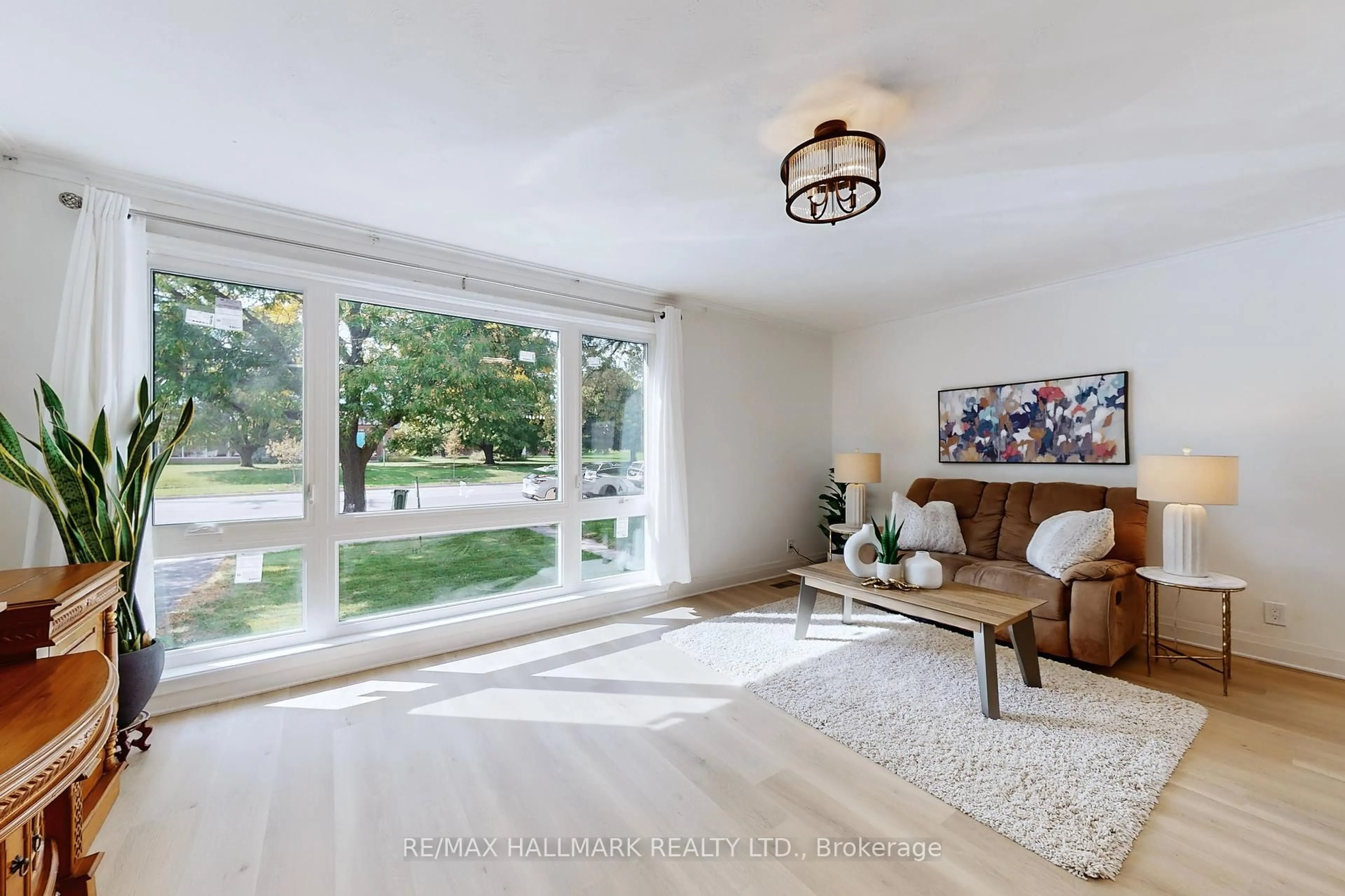 Living room with furniture, unknown for 1393 Birchmount Rd, Toronto Ontario M1P 2E2