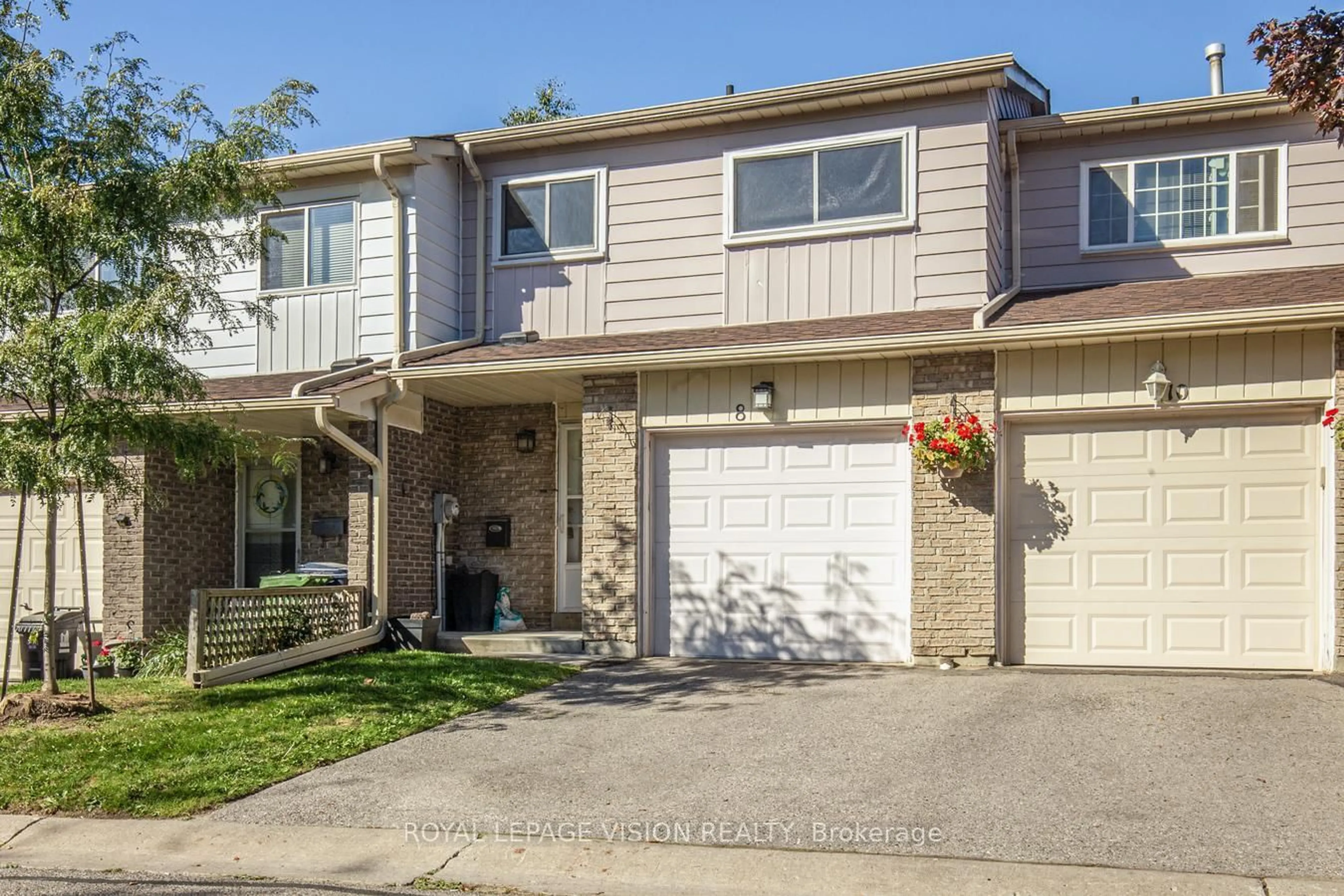 Home with vinyl exterior material, street for 301 Washburn Way #8, Toronto Ontario M1B 1K4