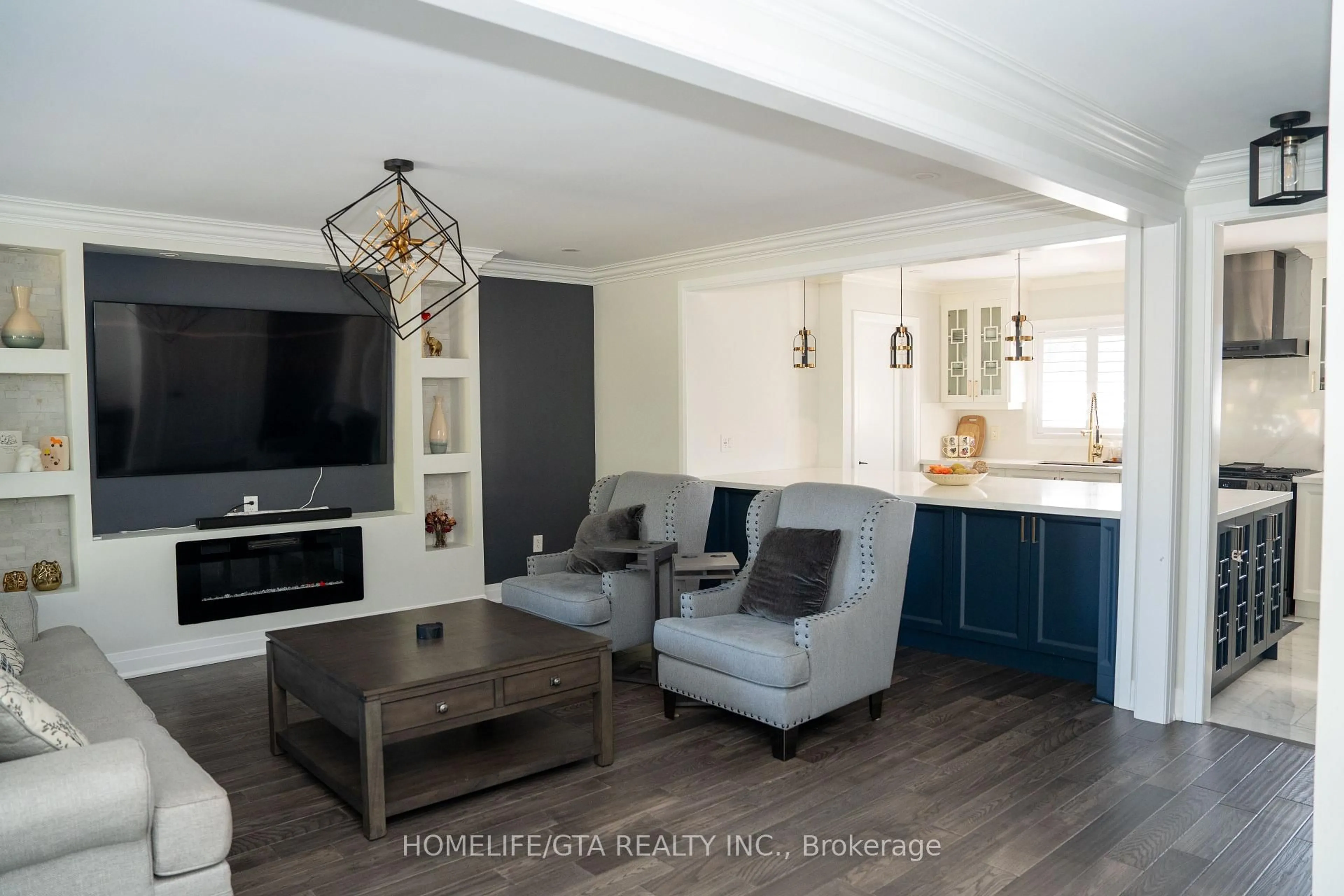 Living room with furniture, wood/laminate floor for 439 Rossland Rd, Oshawa Ontario L1J 3G9