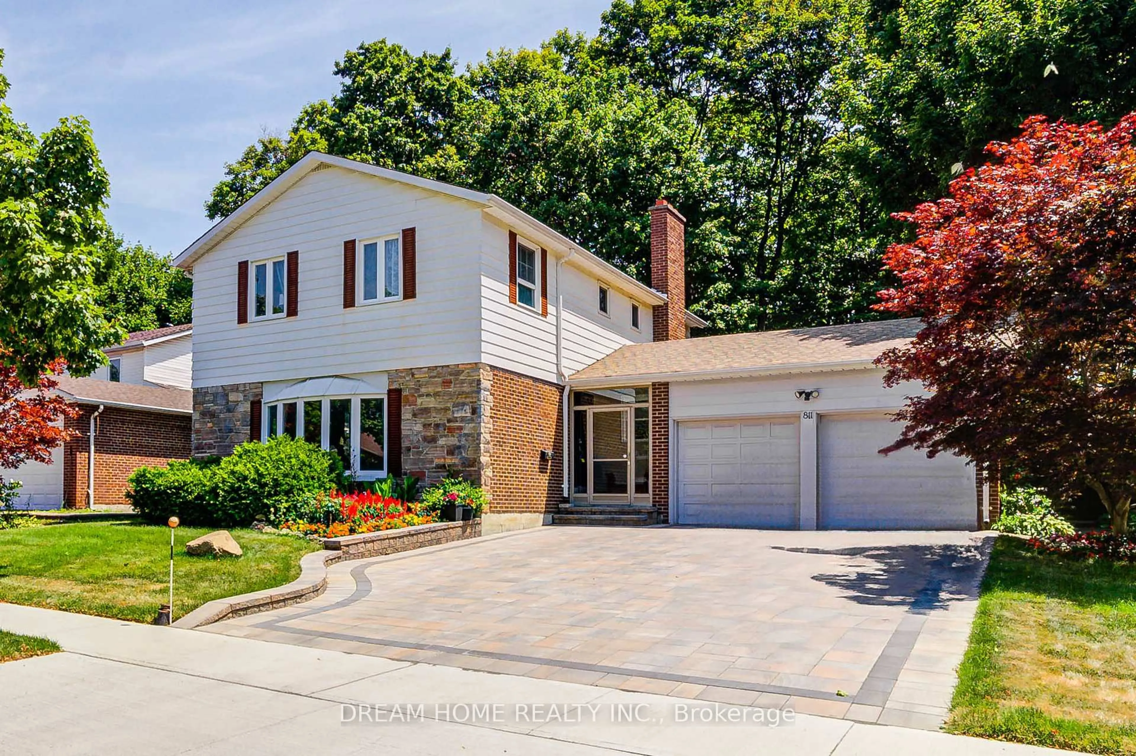 Home with brick exterior material, street for 811 Huntingwood Dr, Toronto Ontario M1T 2L8