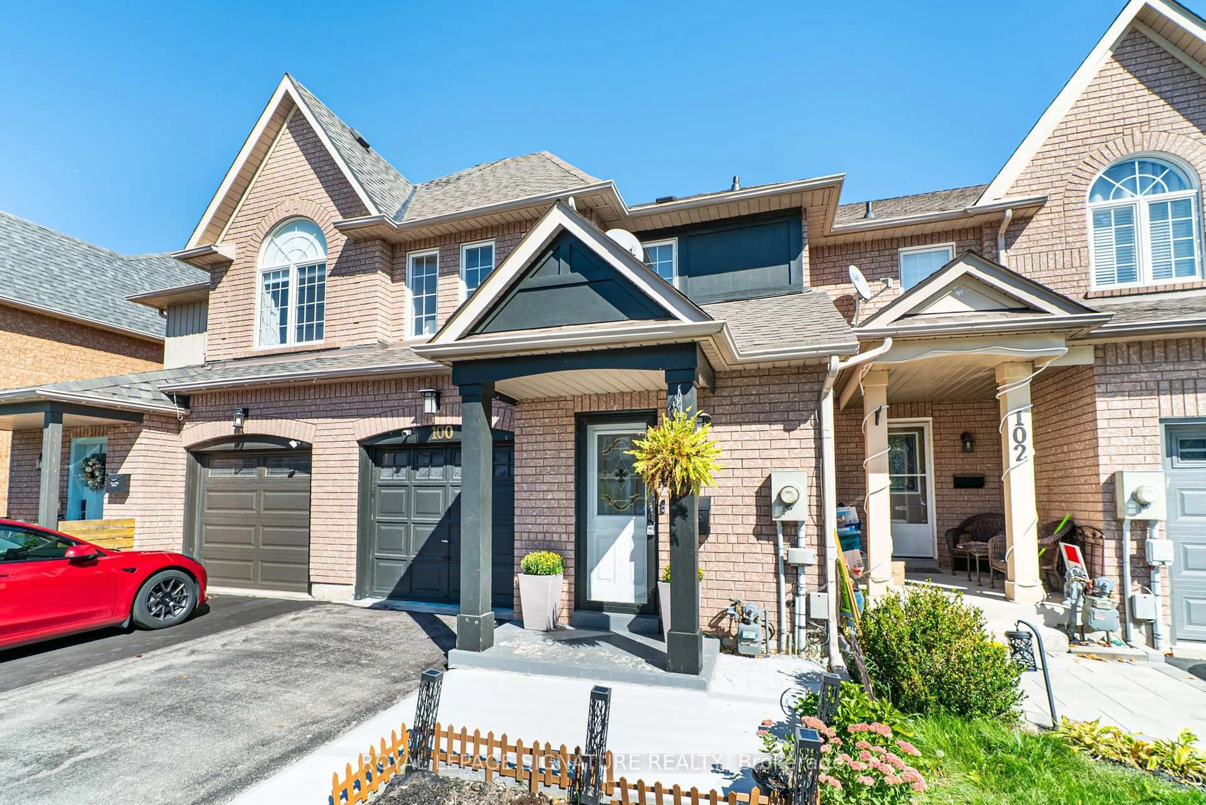 Home with brick exterior material, street for 100 Stokely Cres, Whitby Ontario L1N 9S9