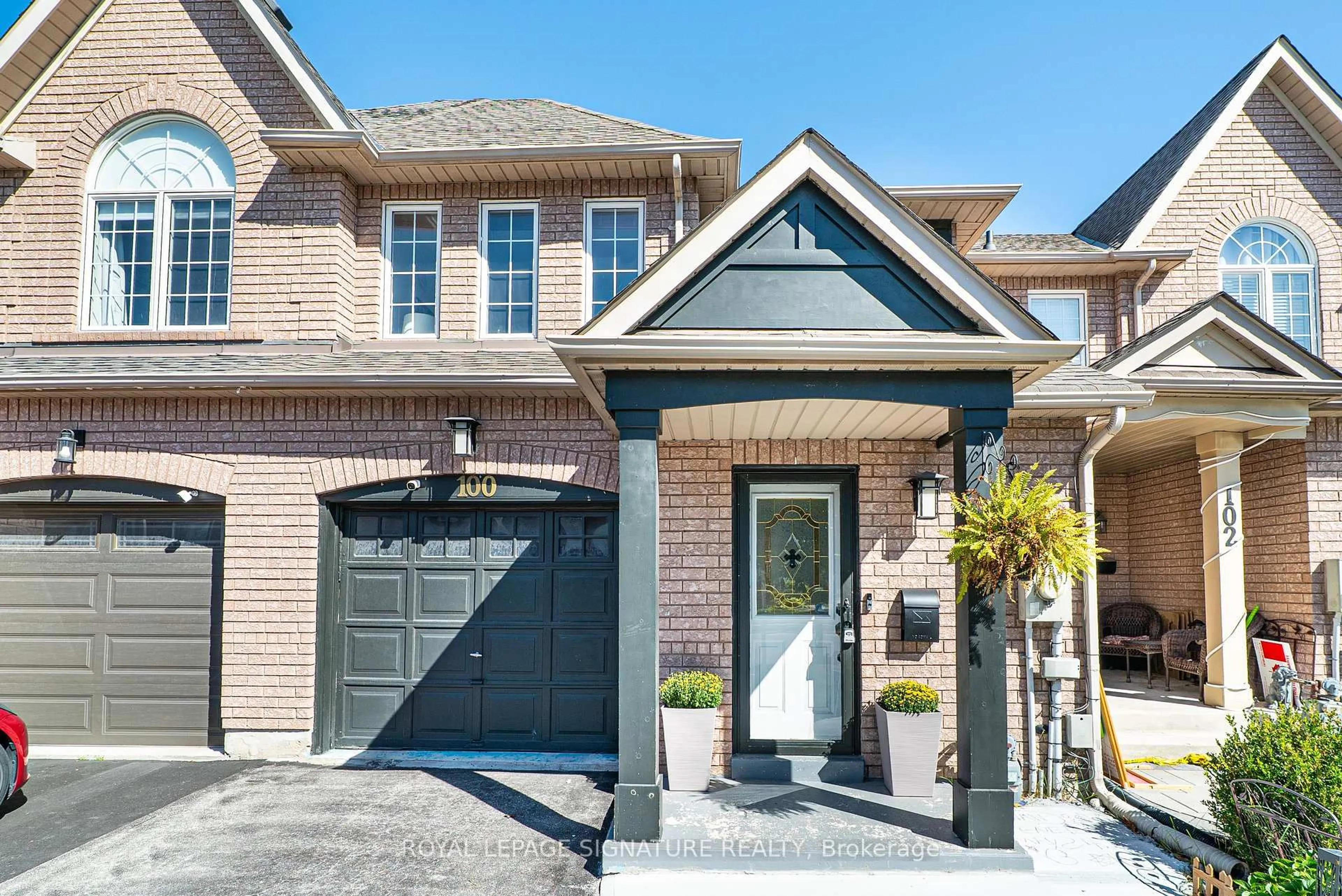 Home with brick exterior material, street for 100 Stokely Cres, Whitby Ontario L1N 9S9