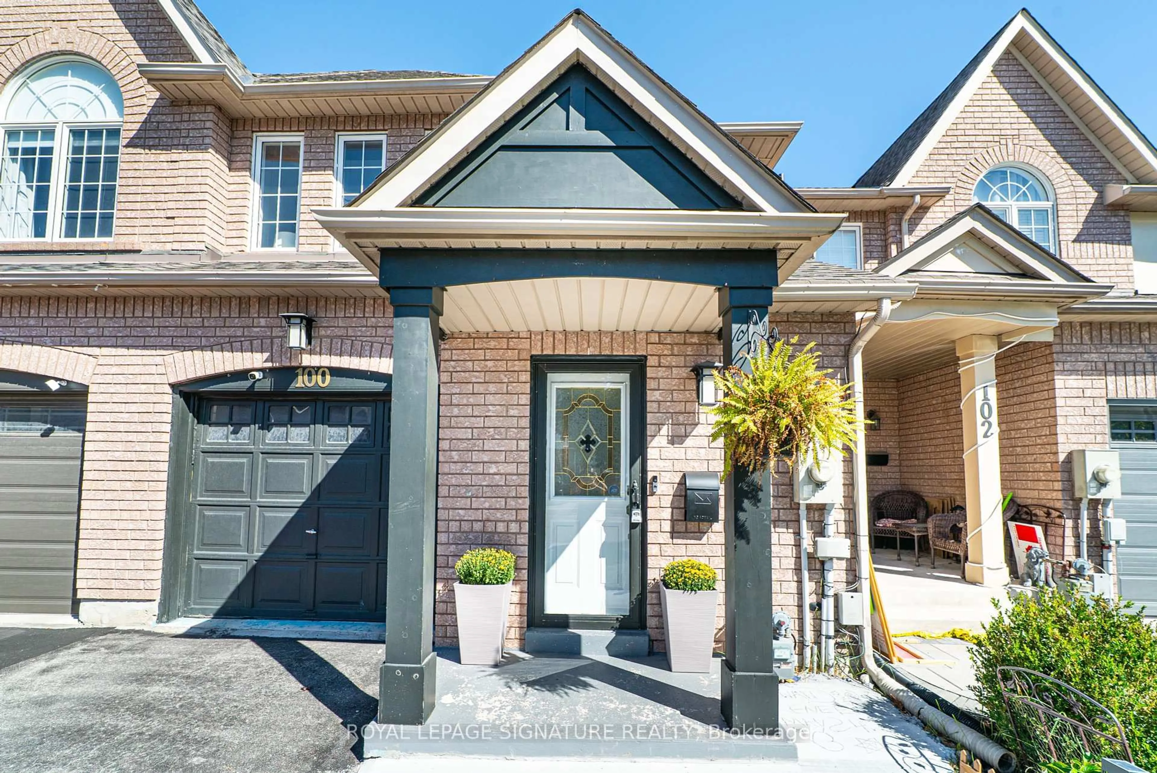 Home with brick exterior material, street for 100 Stokely Cres, Whitby Ontario L1N 9S9