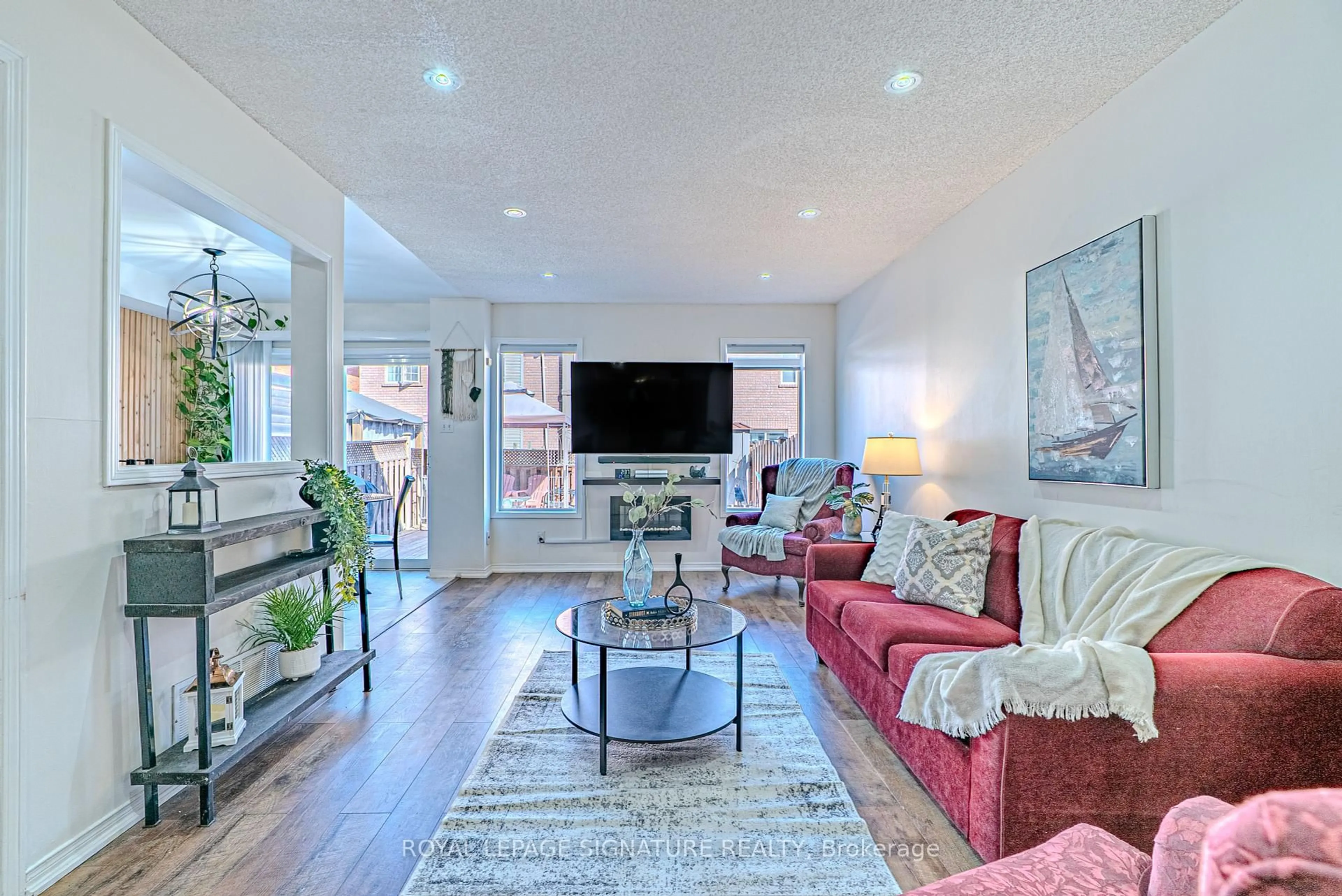 Living room with furniture, unknown for 100 Stokely Cres, Whitby Ontario L1N 9S9