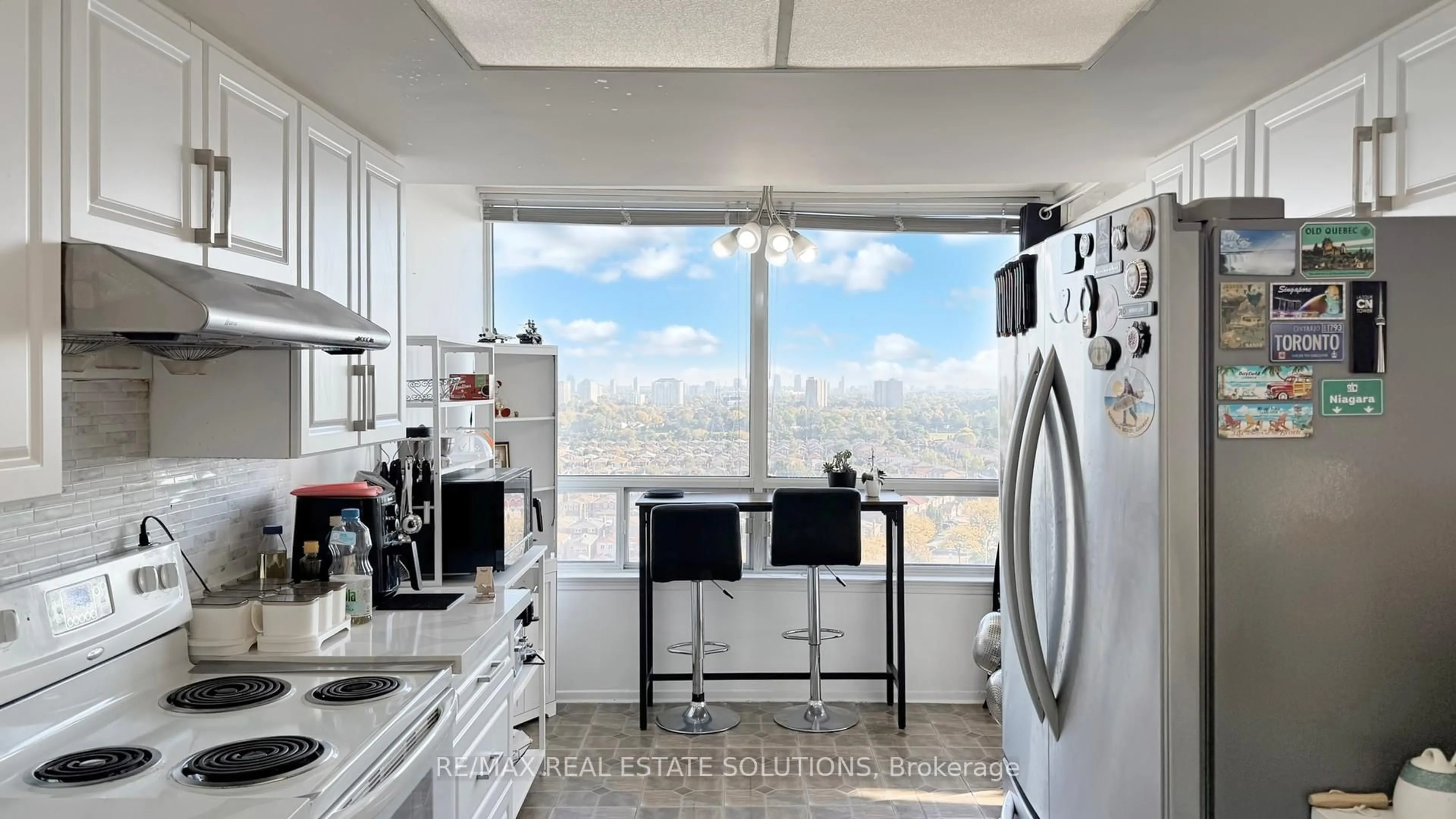 Kitchen with laundary machines, unknown for 330 Alton Towers Circ #1611, Toronto Ontario M1V 5H3
