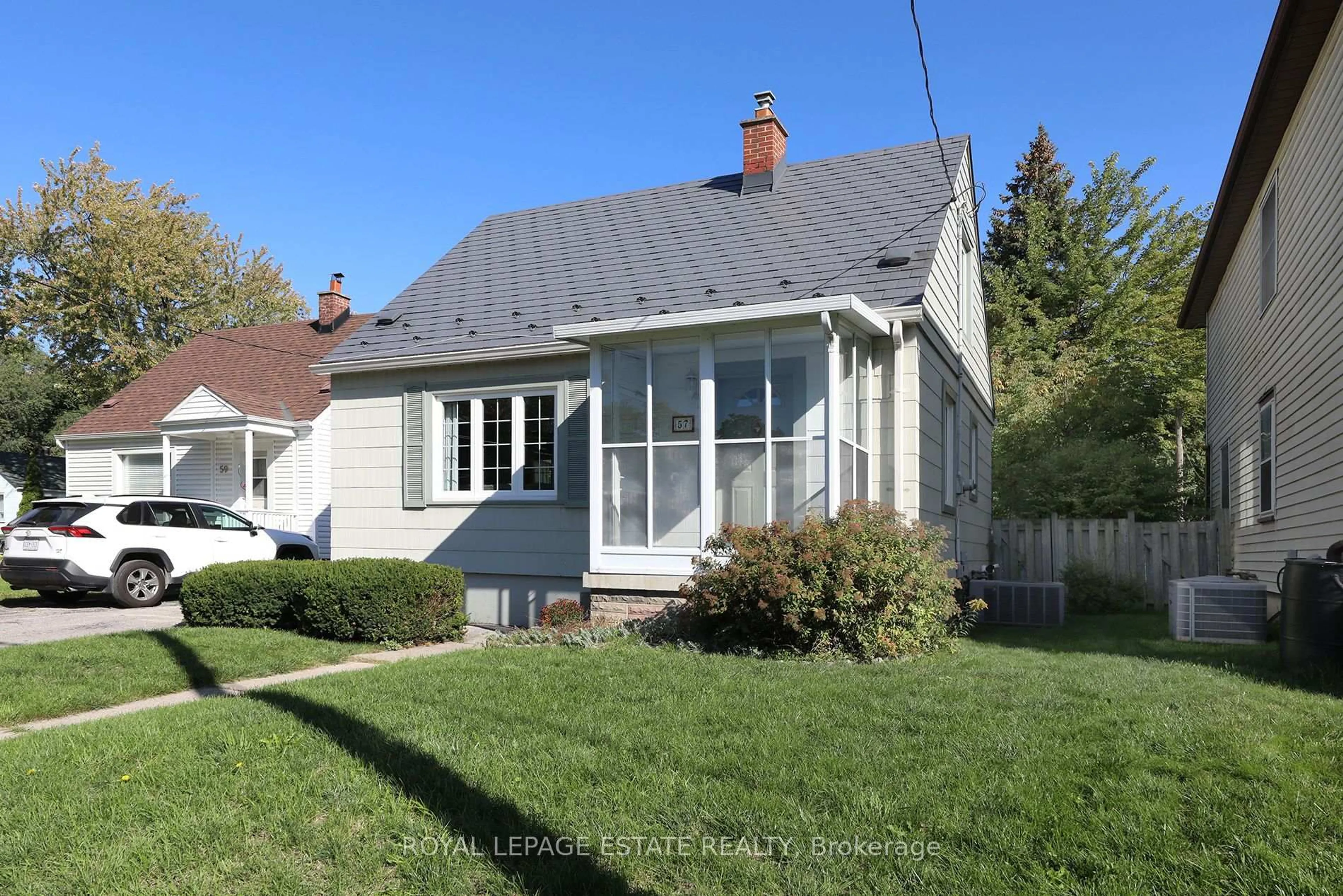 Home with vinyl exterior material, street for 57 Merritt Rd, Toronto Ontario M4B 3K4