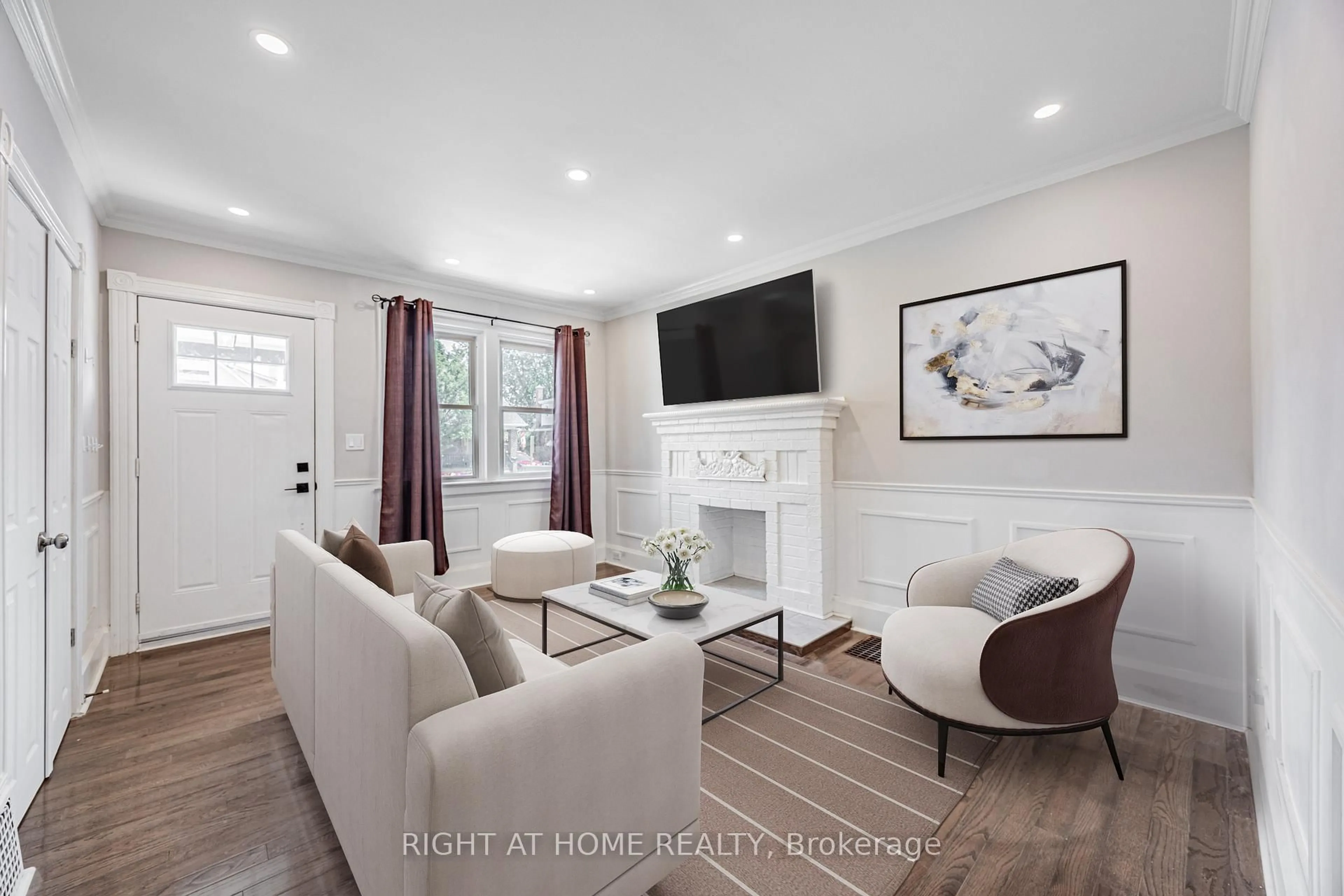 Living room with furniture, wood/laminate floor for 390 Jarvis St, Oshawa Ontario L1G 5L2
