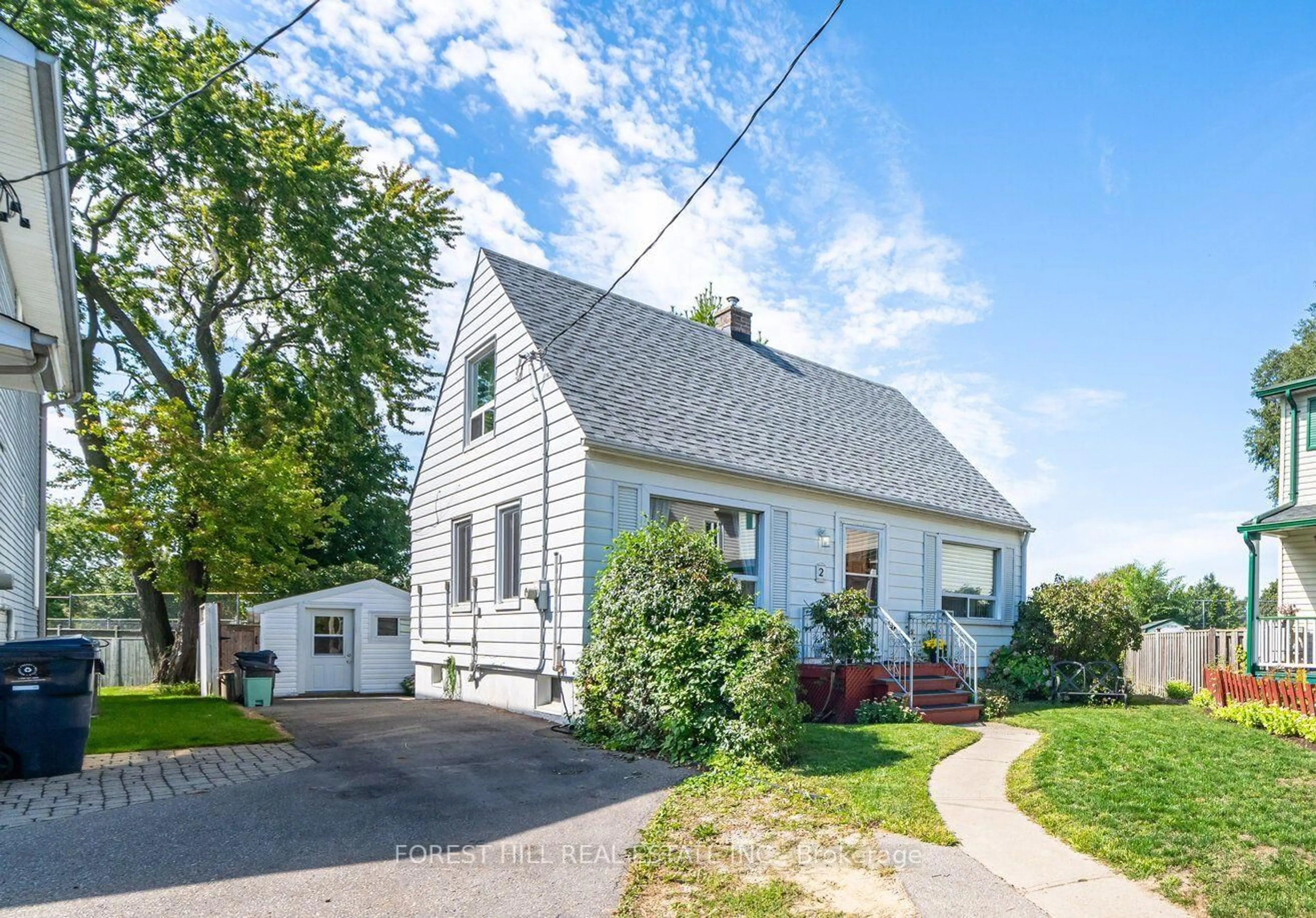 Home with vinyl exterior material, street for 2 Topham Rd, Toronto Ontario M4B 3K2