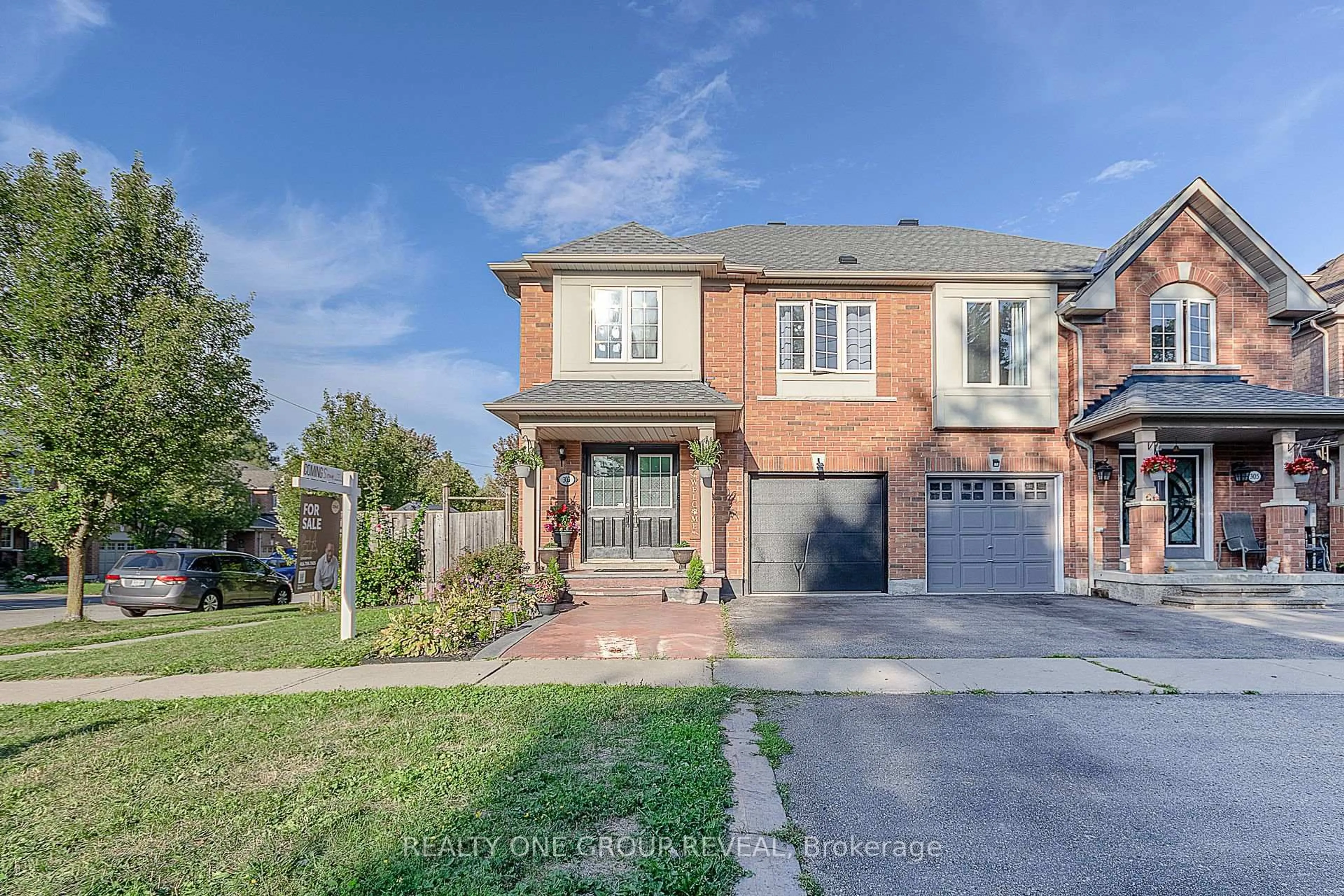 Home with brick exterior material, street for 303 Porte Rd, Ajax Ontario L1S 0A4