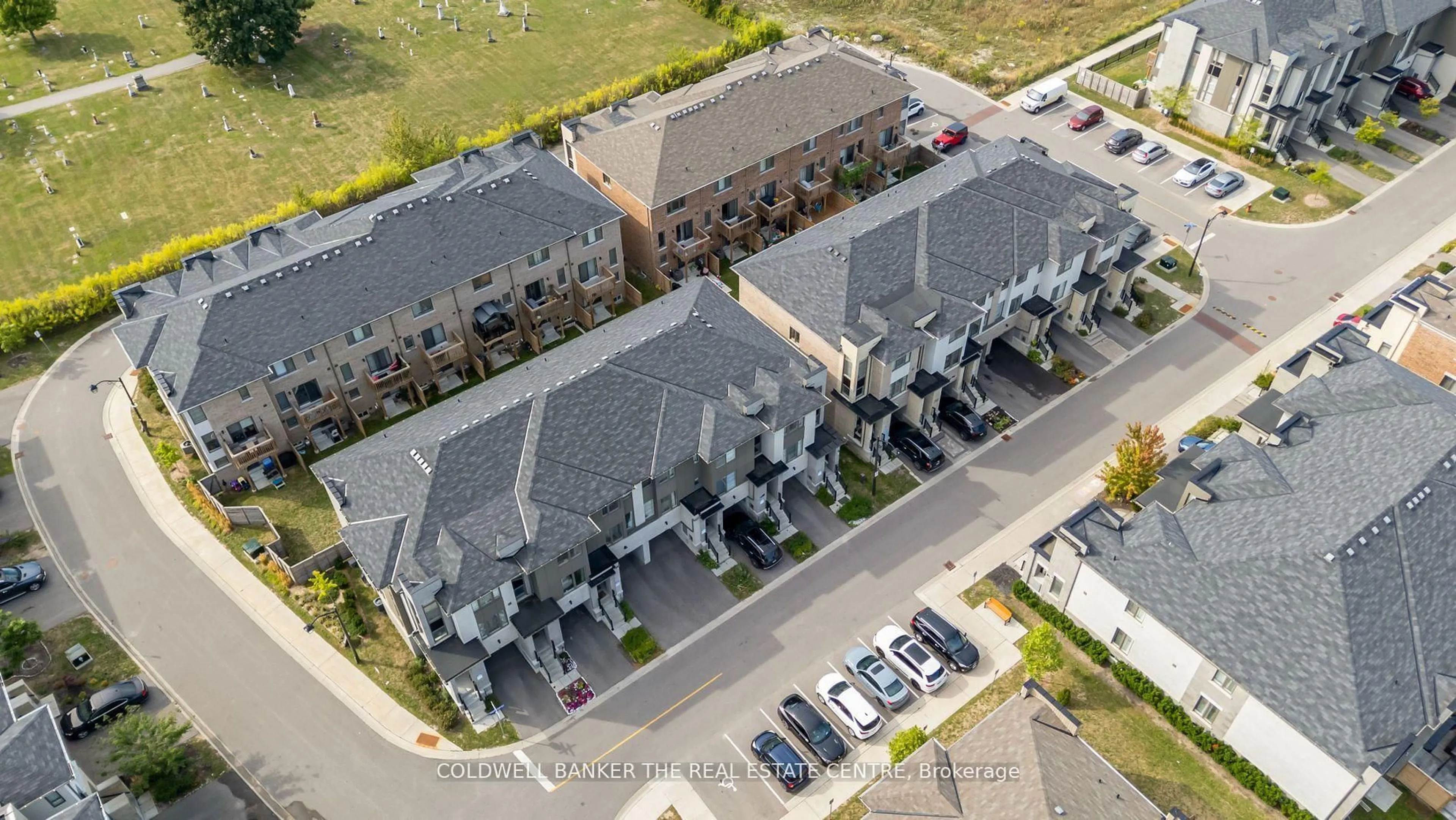 A pic from outside/outdoor area/front of a property/back of a property/a pic from drone, street for 67 Donald Fleming Way #106, Whitby Ontario L1R 0N8