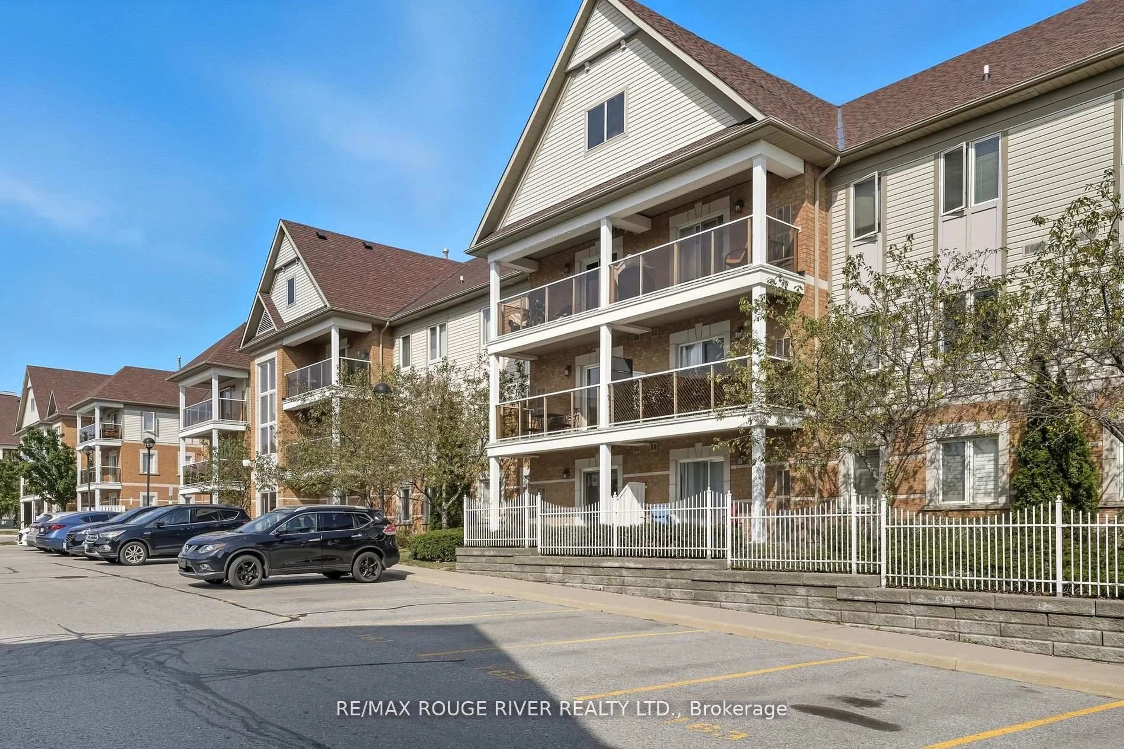 A pic from outside/outdoor area/front of a property/back of a property/a pic from drone, street for 120 Aspen Springs Dr #104, Clarington Ontario L1C 0G7