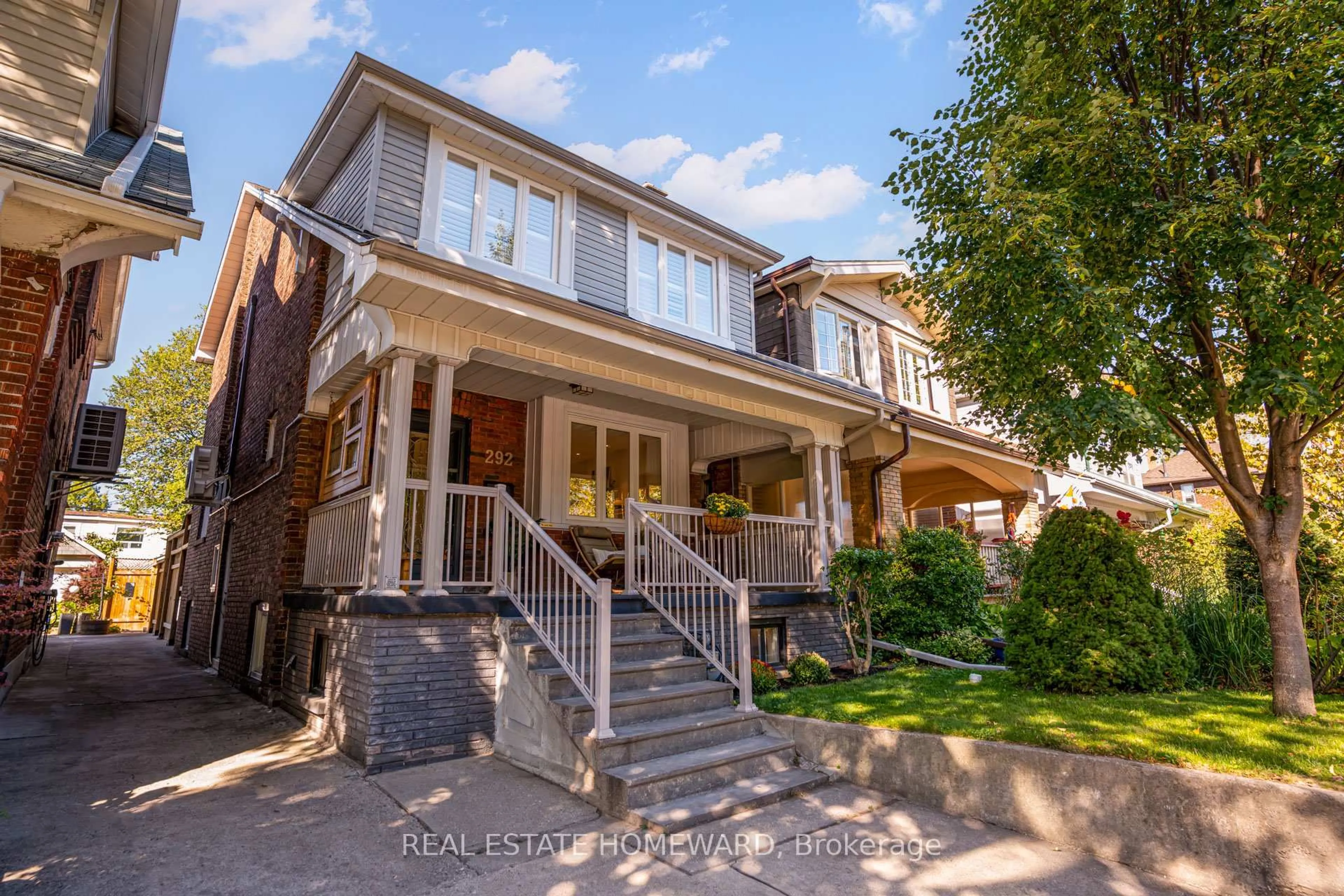 Home with brick exterior material, street for 292 Glebeholme Blvd, Toronto Ontario M4J 1T2