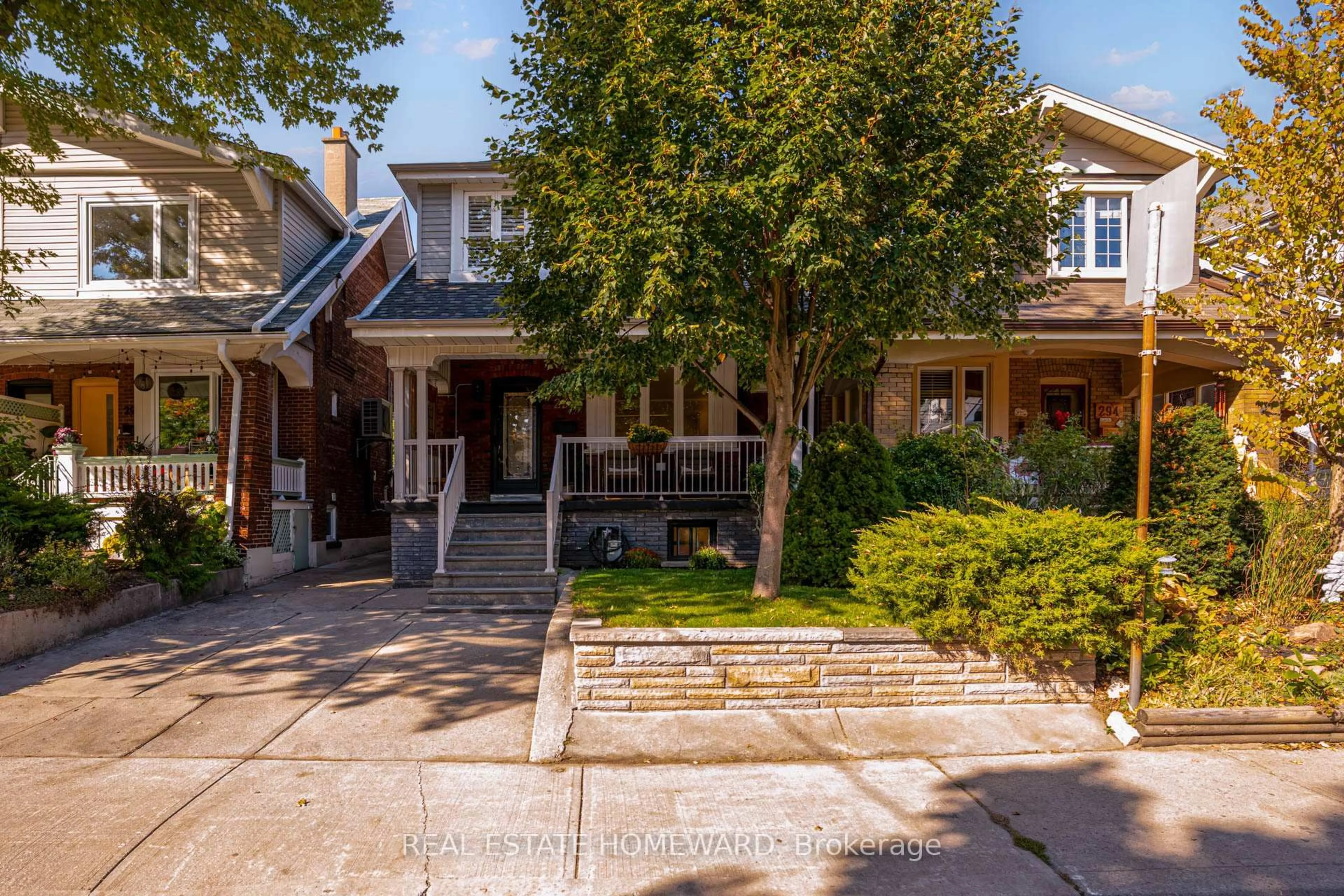 Home with brick exterior material, street for 292 Glebeholme Blvd, Toronto Ontario M4J 1T2