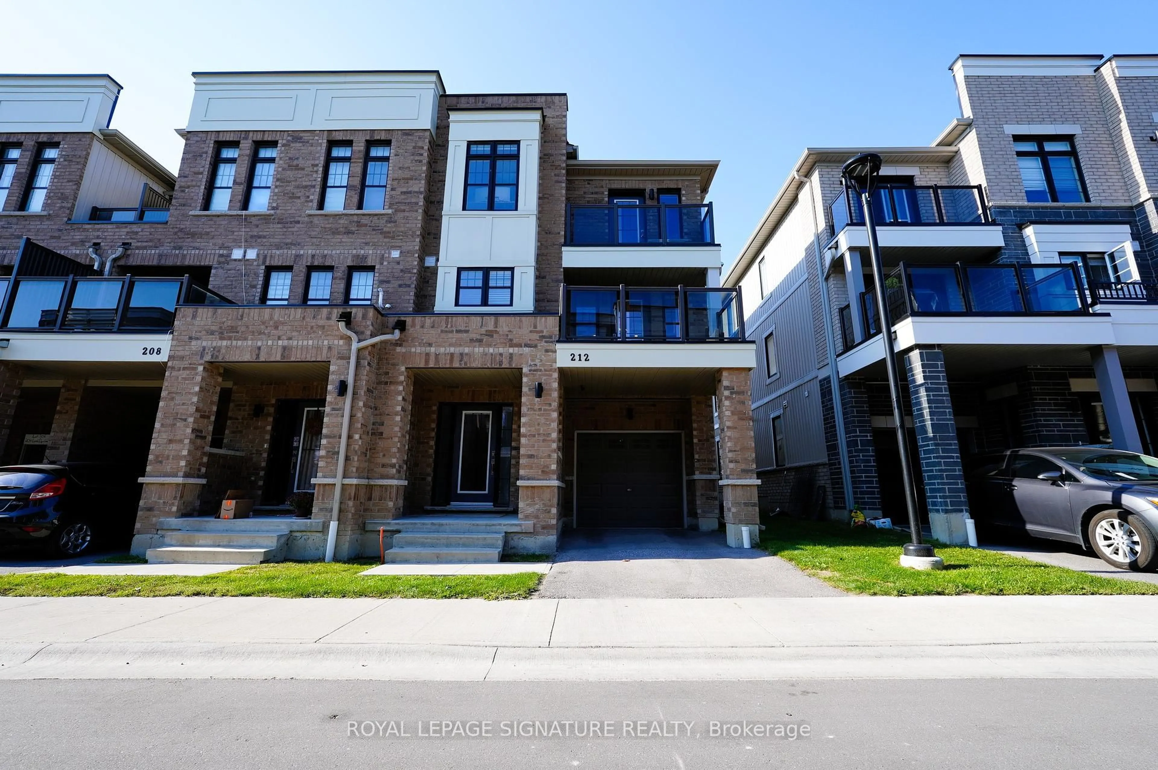 Home with brick exterior material, street for 212 Lord Elgin Lane, Clarington Ontario L1C 7E8