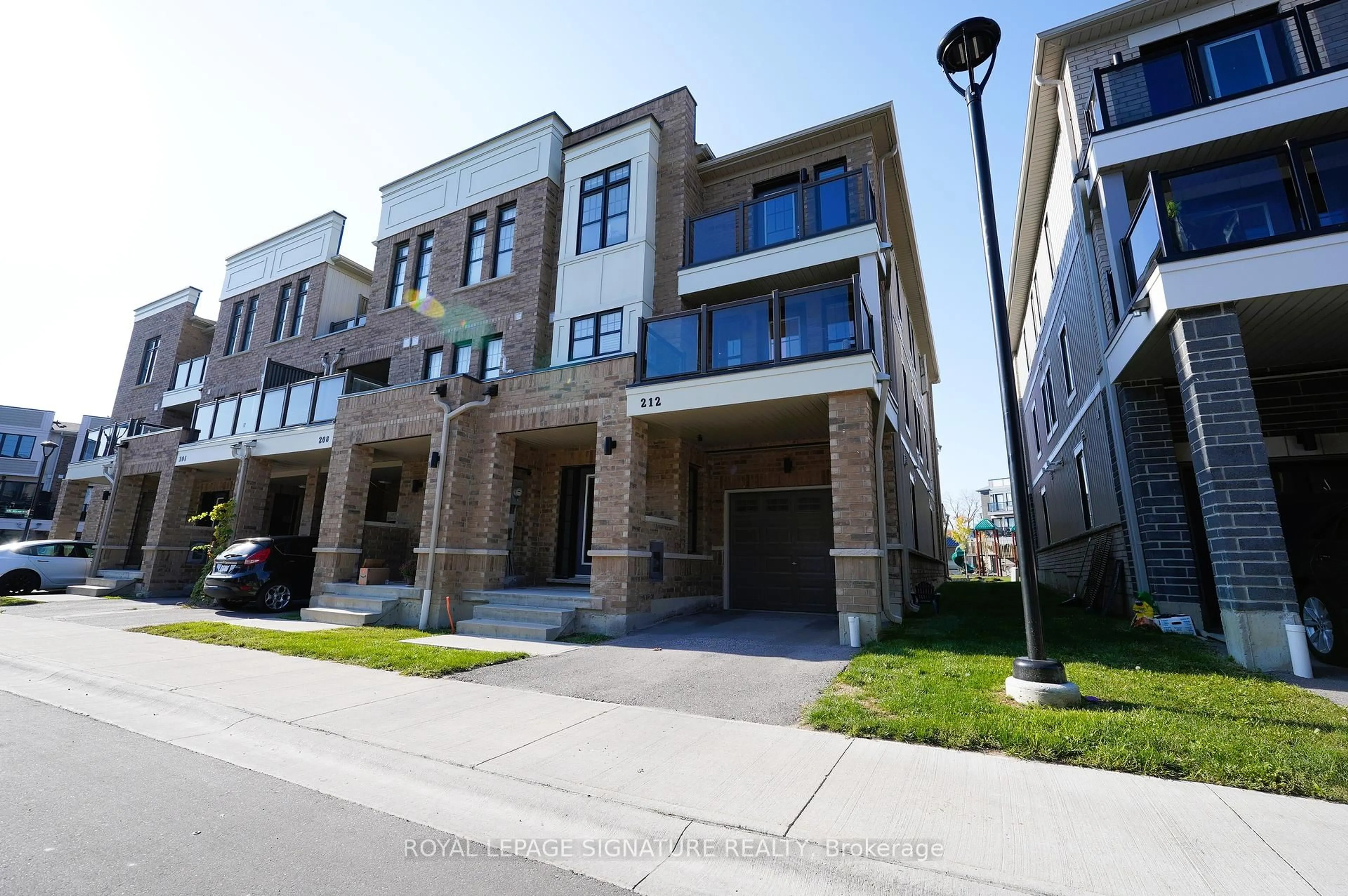 Home with brick exterior material, street for 212 Lord Elgin Lane, Clarington Ontario L1C 7E8
