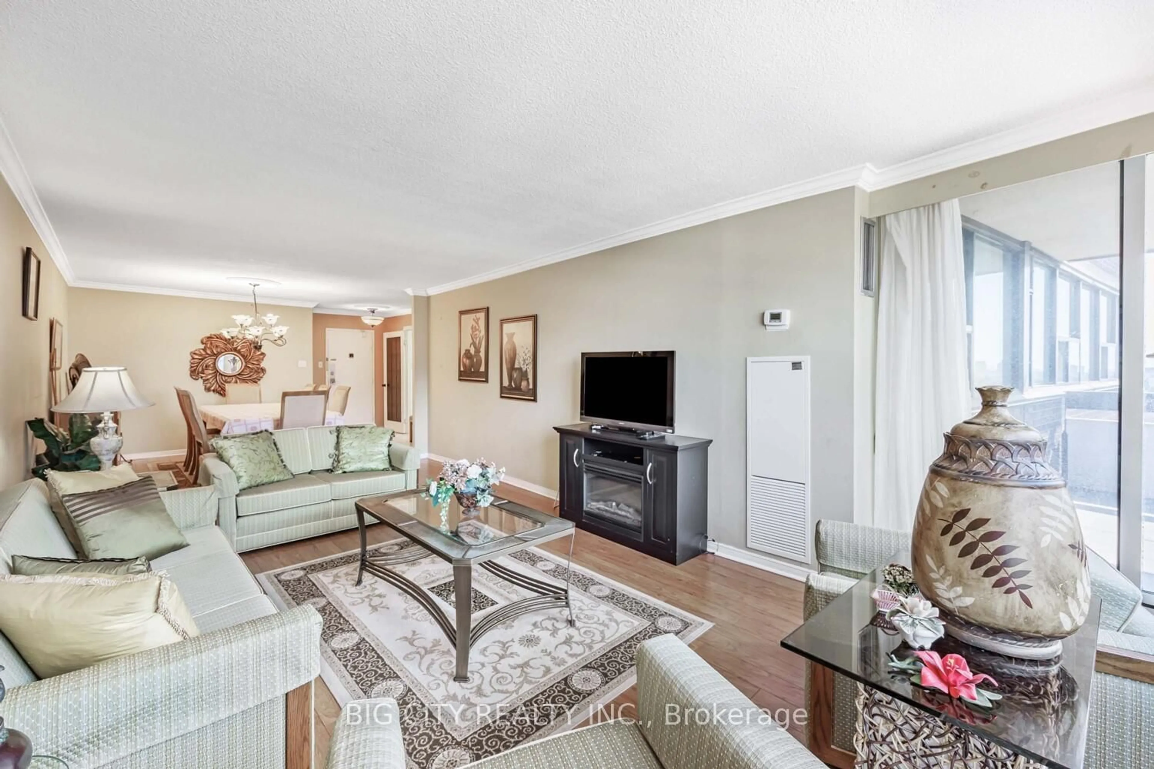 Living room with furniture, unknown for 55 Huntingdale Blvd ##1407, Toronto Ontario M1W 2N9