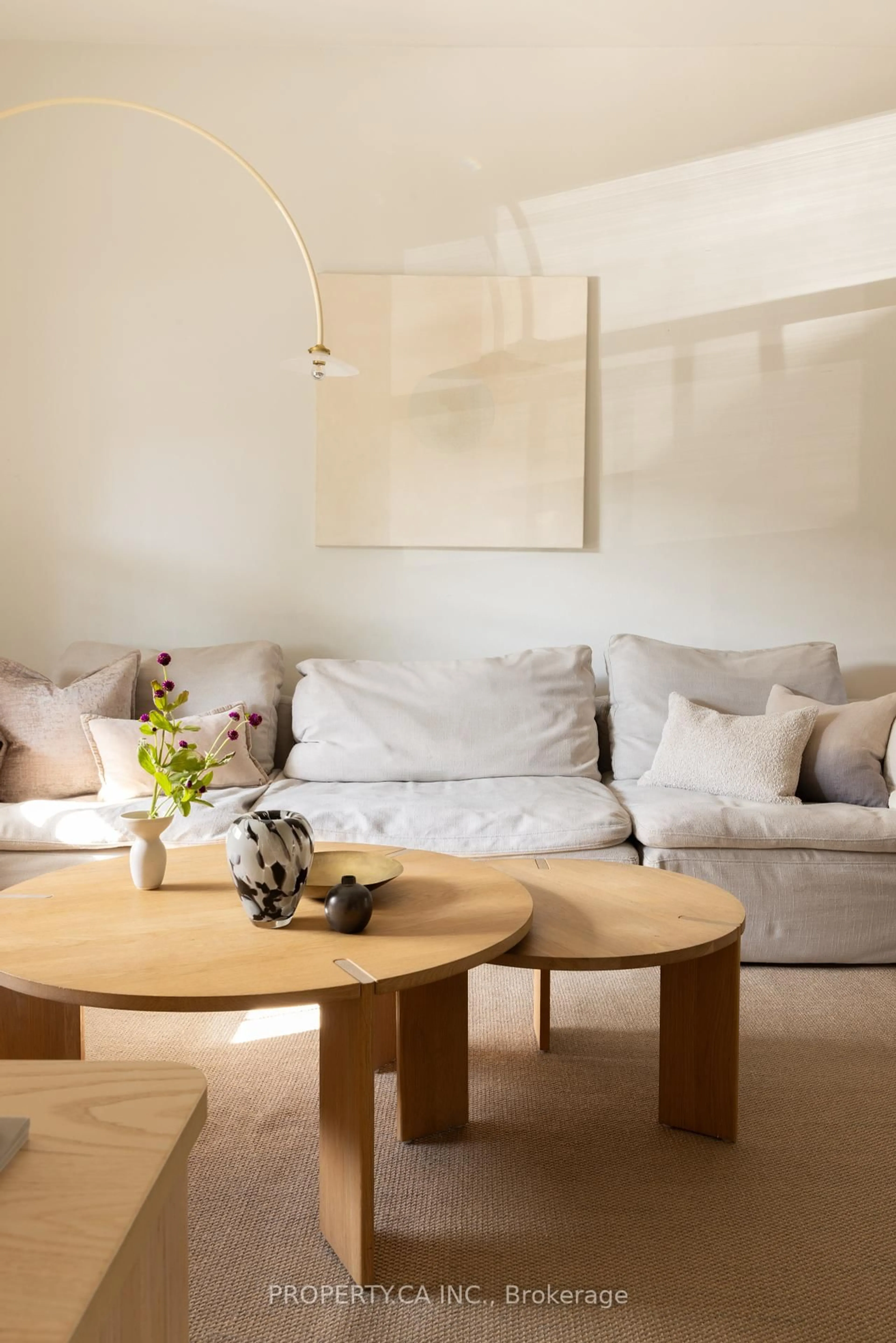 Living room with furniture, wood/laminate floor for 9 Howland Rd, Toronto Ontario M4K 2Z4