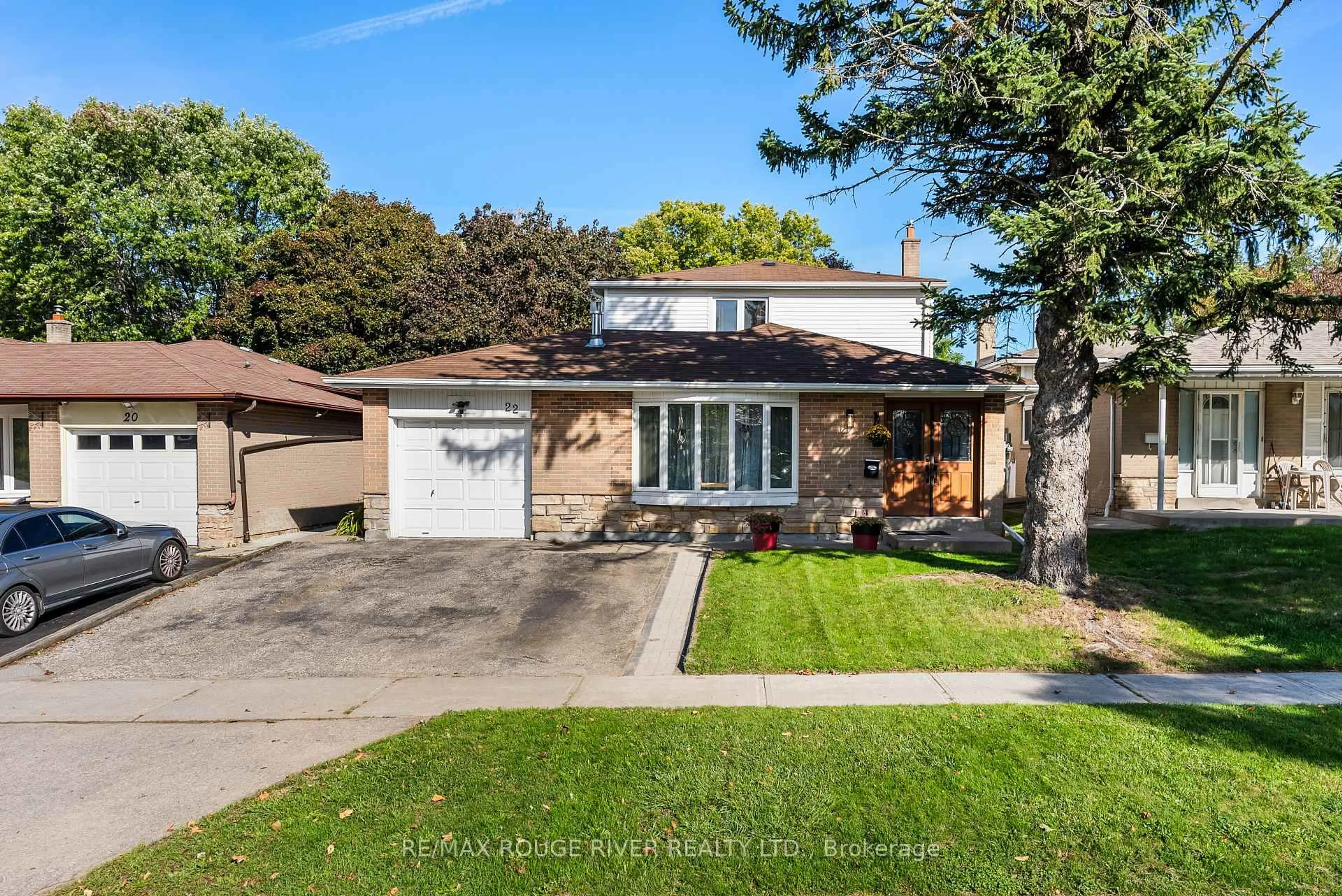 Home with brick exterior material, street for 22 Tweedrock Cres, Toronto Ontario M1E 4L5